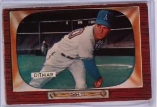 1955 Bowman Art Ditmar Baseball Card: 1955 Bowman baseball card featuring Art Ditmar, a pitcher known for his time with the New York Yankees. The card showcases Ditmar in action on the field, wearing jersey number 10, and features vibrant