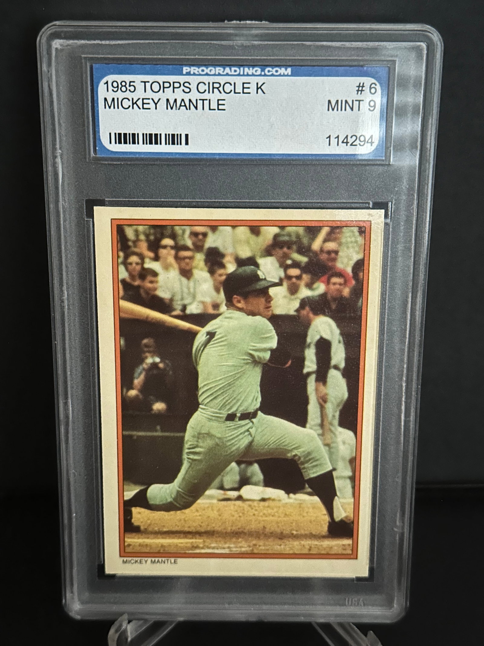 1985 Topps Circle K Mickey Mantle Baseball Card Graded 9: 1985 Topps Circle K baseball card featuring the legendary player Mickey Mantle. The card is classified as #6 and has been graded as Mint 9, showcasing its excellent condition. Known for its vibrant