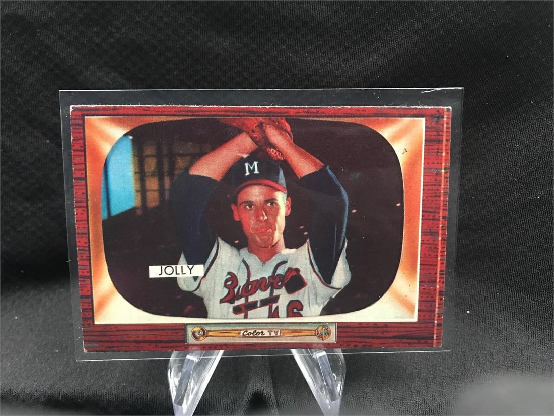 1955 Bowman #71 Dave Jolly baseball card featuring the Milwaukee Braves pitcher.: Dave Jolly was a right-handed relief pitcher who played for organizations including the St. Louis Browns, Cincinnati Reds, New York Yankees, and Milwaukee Braves.