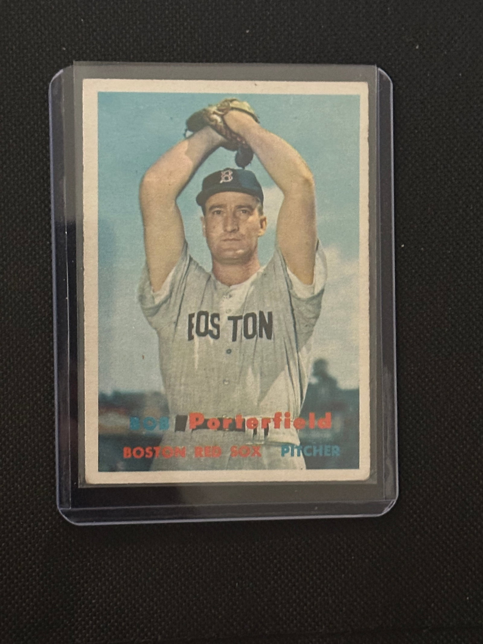 1957 Topps Baseball Card featuring Boston Red Sox pitcher Bob Porterfield.: Player History: Porterfield played in the MLB from 1951 to 1959, pitching for the Washington Senators, Boston Red Sox, and Pittsburgh Pirates.