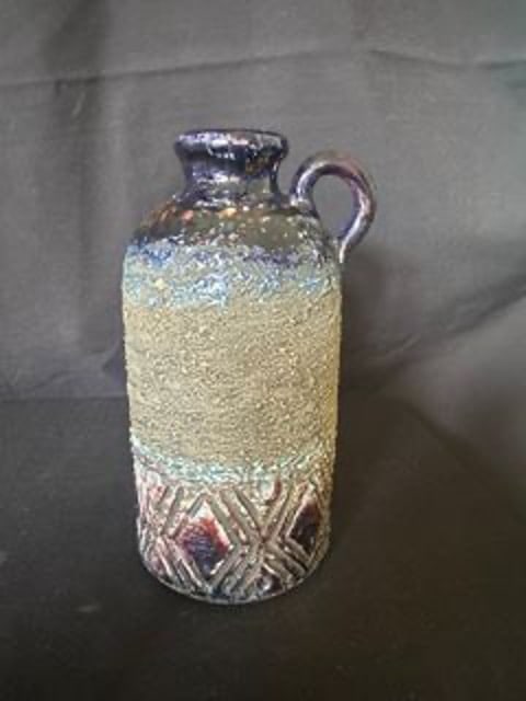 Vintage Tilgmans Vase: Beautiful Kunstkeramik Pottery. Beautiful Jug or Vase from Tilgmans in Sweden in the 1960s. Another Beautiful Tilgmans piece. This hand made timeless beauty has a ton of detail and is in great shape. 