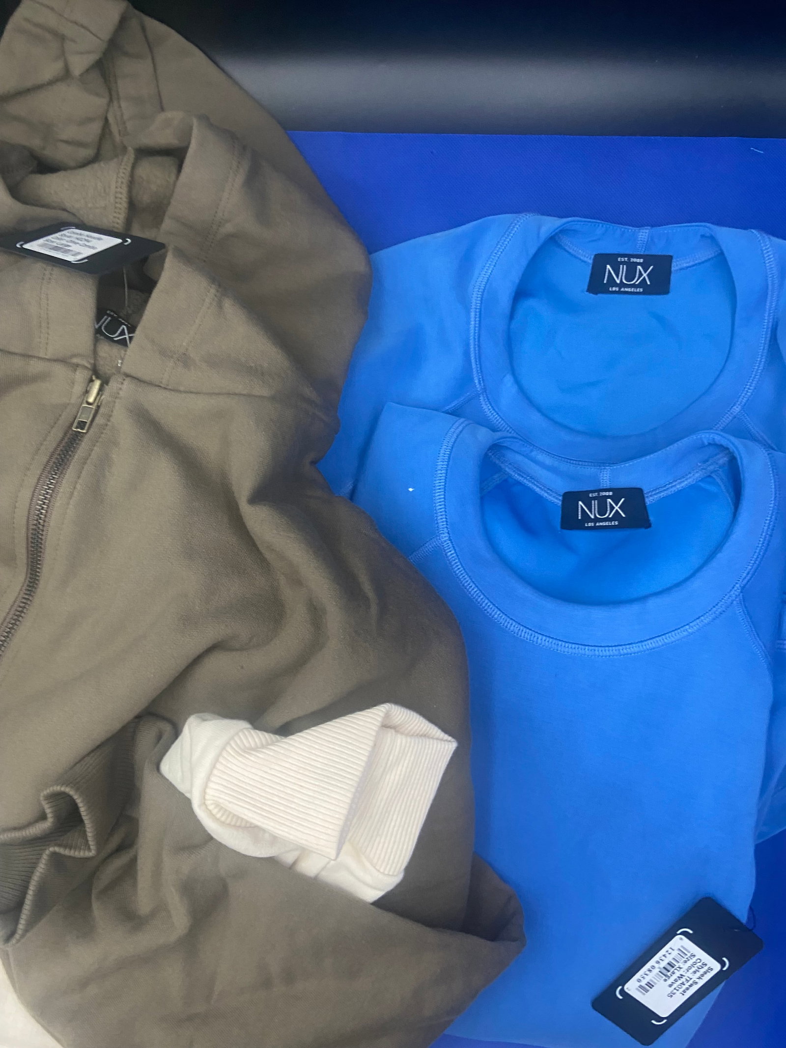 Streetwear brand new: Brand New with tags NUX streetwear tops. All sizes are large. Combo Hoodie, Sleek Sweat. Lot of 4 High Estimate: 500.00