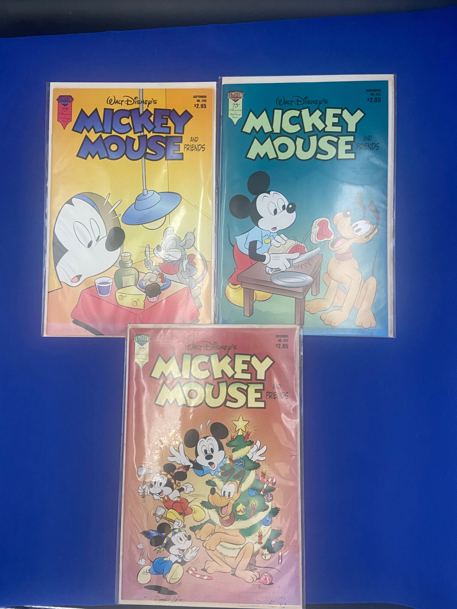 Mickey Mouse Comic Collection Lot of 3: three vintage Disney Mickey Mouse comics, showcasing the beloved character in various adventures. Each comic is numbered and contains iconic illustrations, with titles including 'Mickey Mouse and