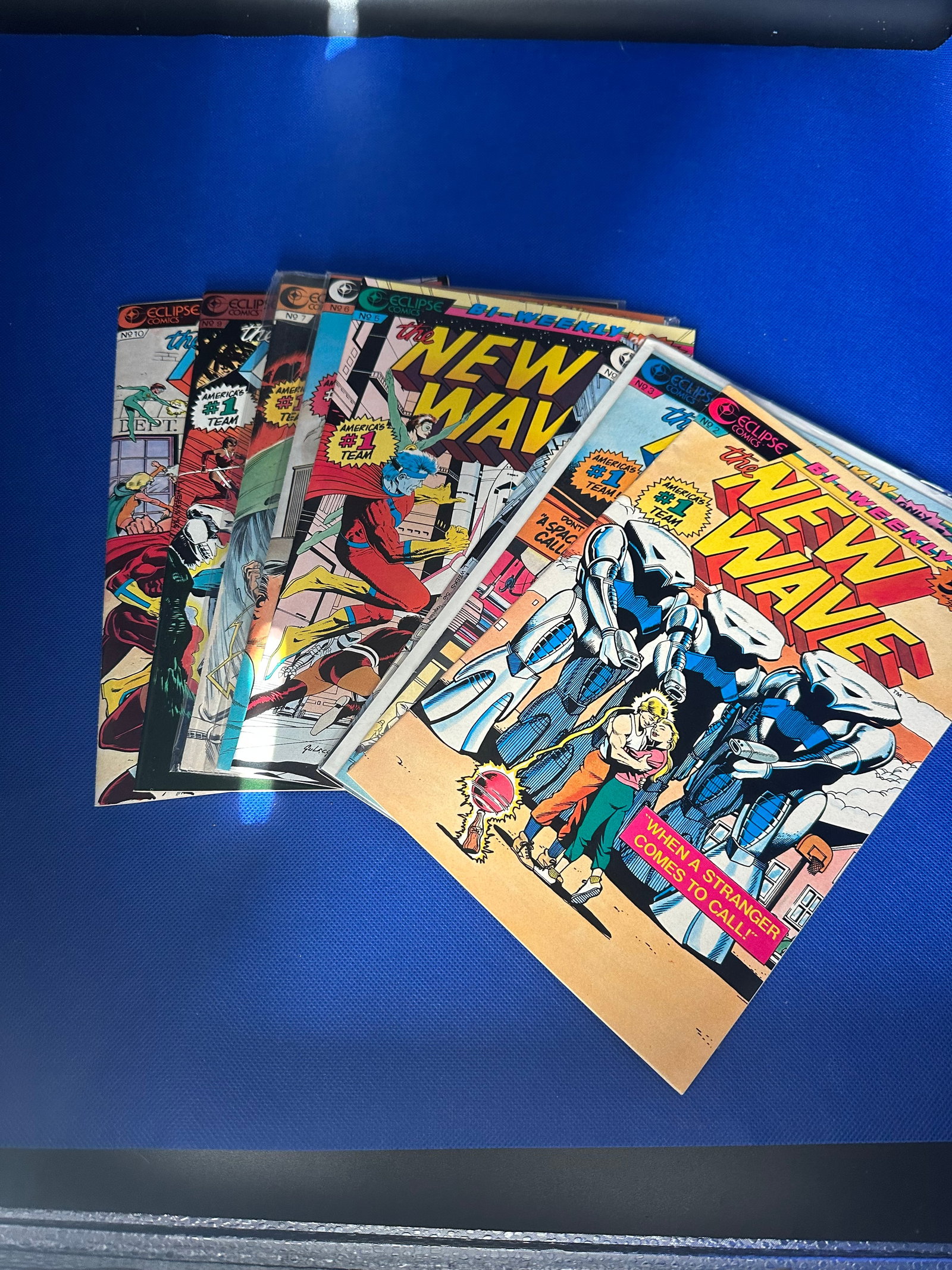 New Wave Comic Series Collection lot of 8: comic books from the 'New Wave' series, published by Eclipse Comics. Each issue showcases vibrant artwork and intriguing storylines typical of the late 1980s and early 1990s. These comics reflect the