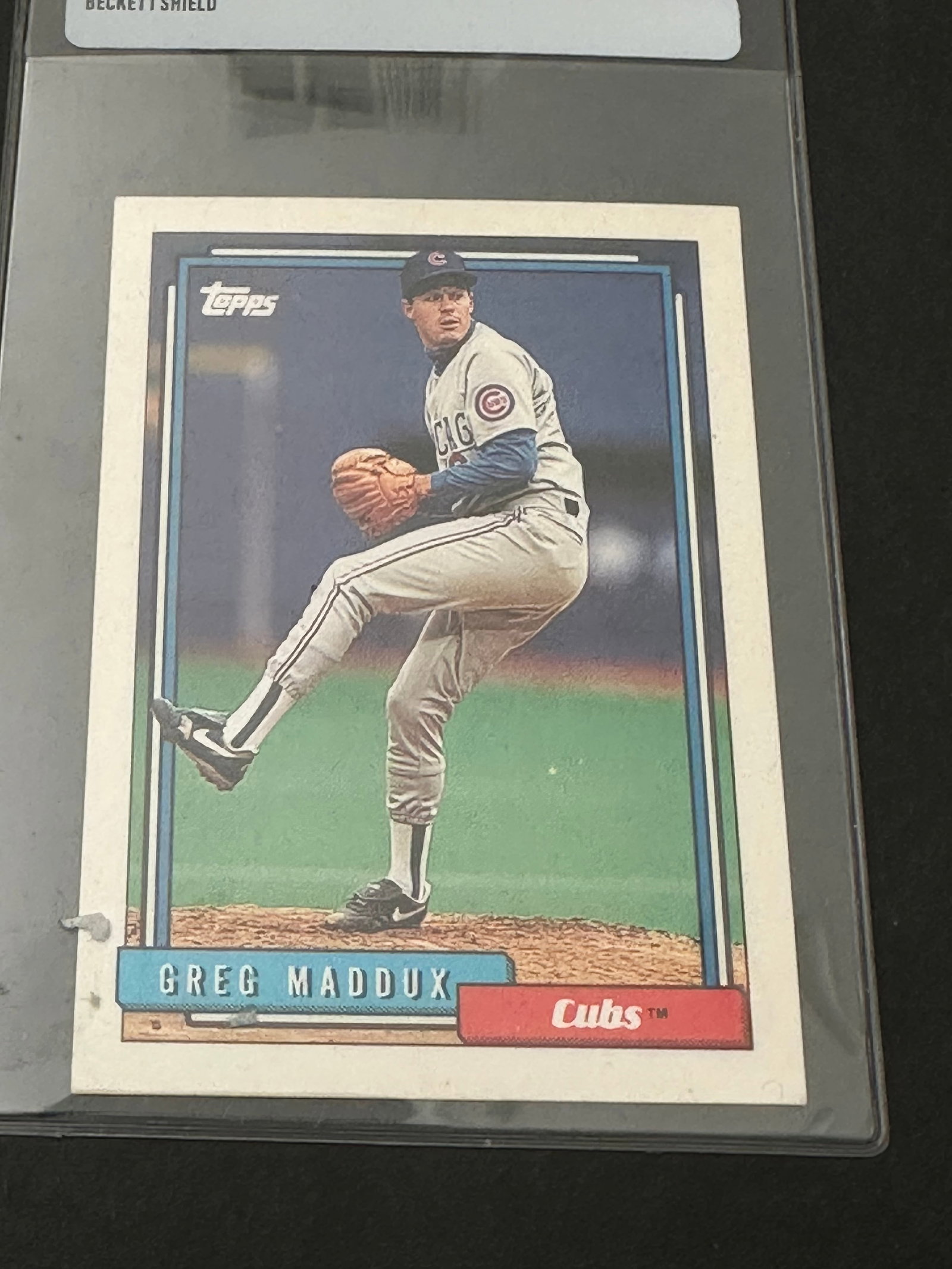 1993 Topps baseball card featuring Hall of Fame pitcher Greg Maddux (1 of 2)