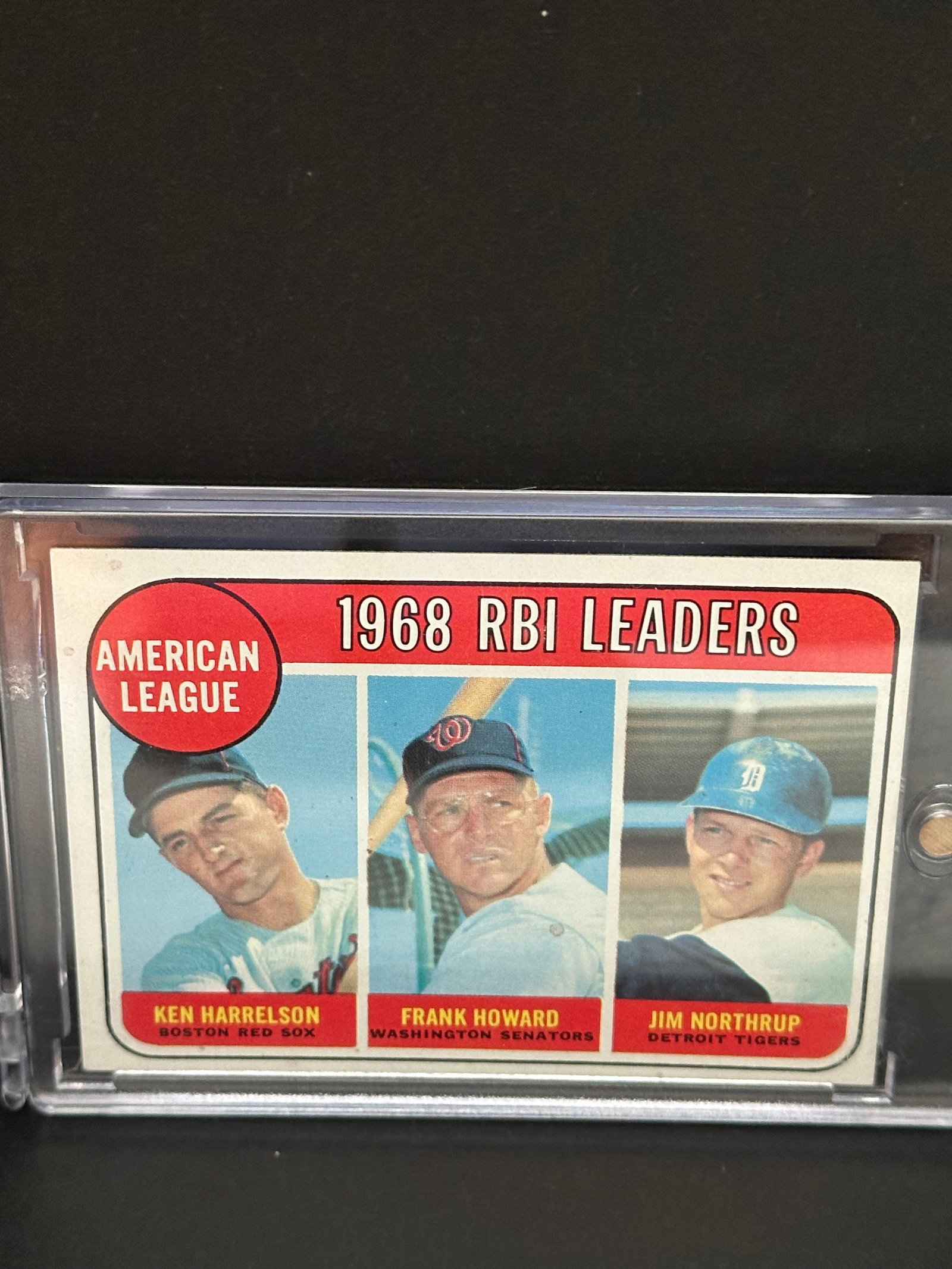 American League RBI Leaders from the 1968 season.: This is a 1969 Topps baseball card featuring the American League RBI Leaders from the 1968 season. The card showcases Jim Northrup of the Detroit Tigers, Frank Howard of the Washington Senators, and K