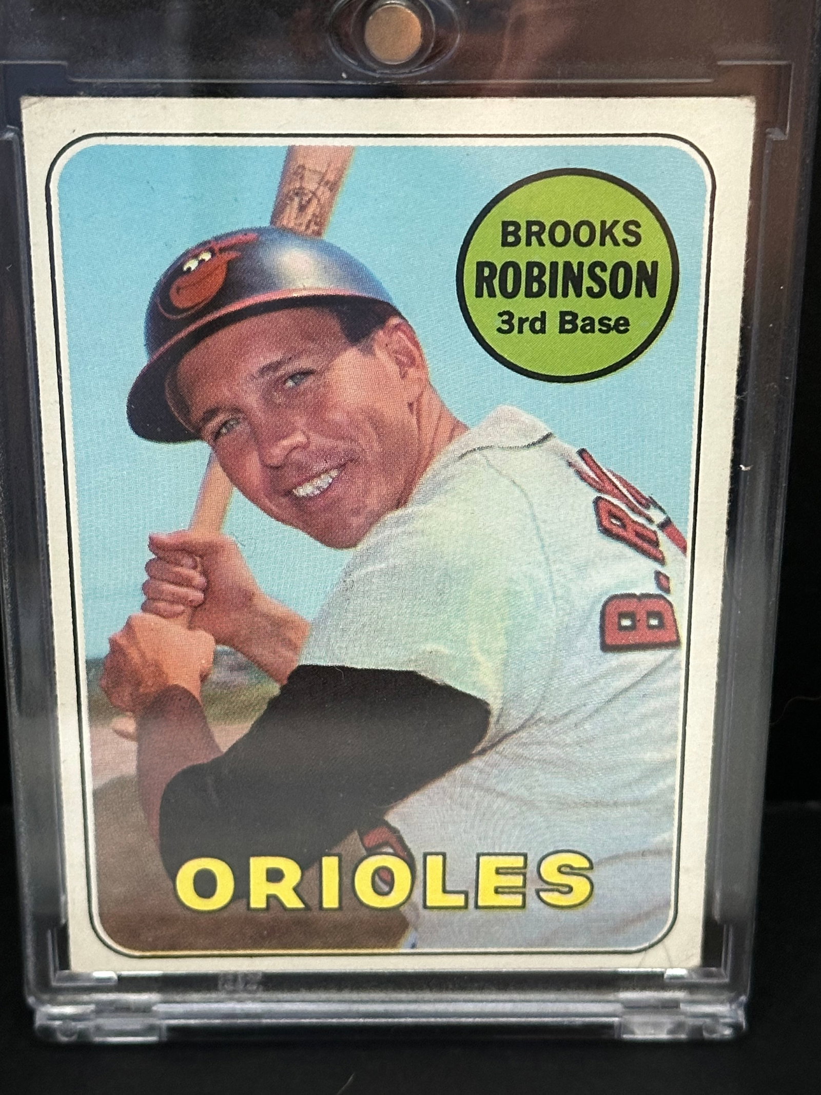 Brooks Robinson of the Baltimore Orioles: This is a 1972 Topps baseball card featuring Brooks Robinson of the Baltimore Orioles. The card displays his full major league batting record through the 1968 season and a biographical cartoon illustr