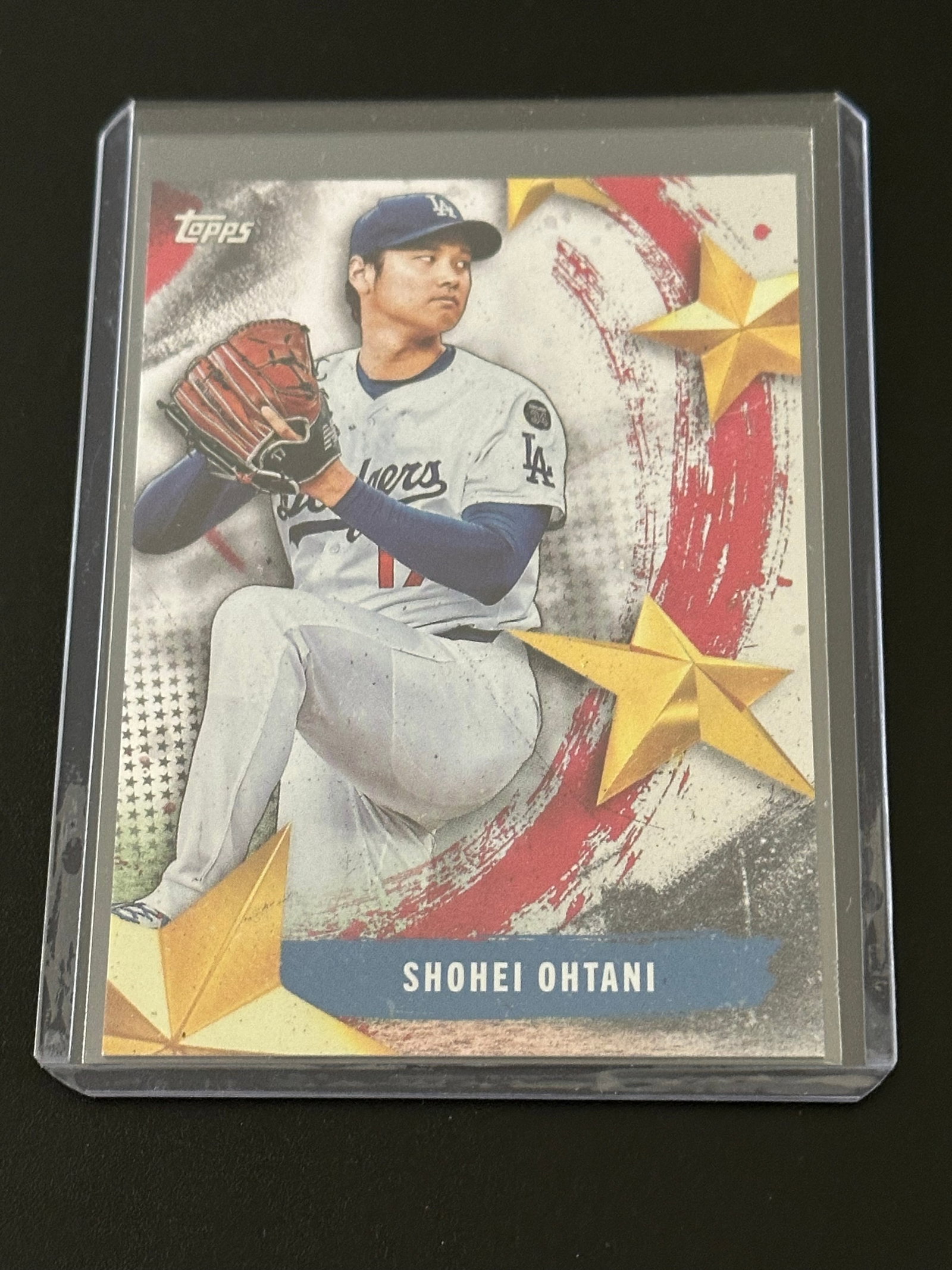 2025 Topps Update "Stars of MLB" insert card featuring Shohei Ohtani: This is a 2025 Topps Update "Stars of MLB" insert card featuring Shohei Ohtani (Card #SMLB-77).