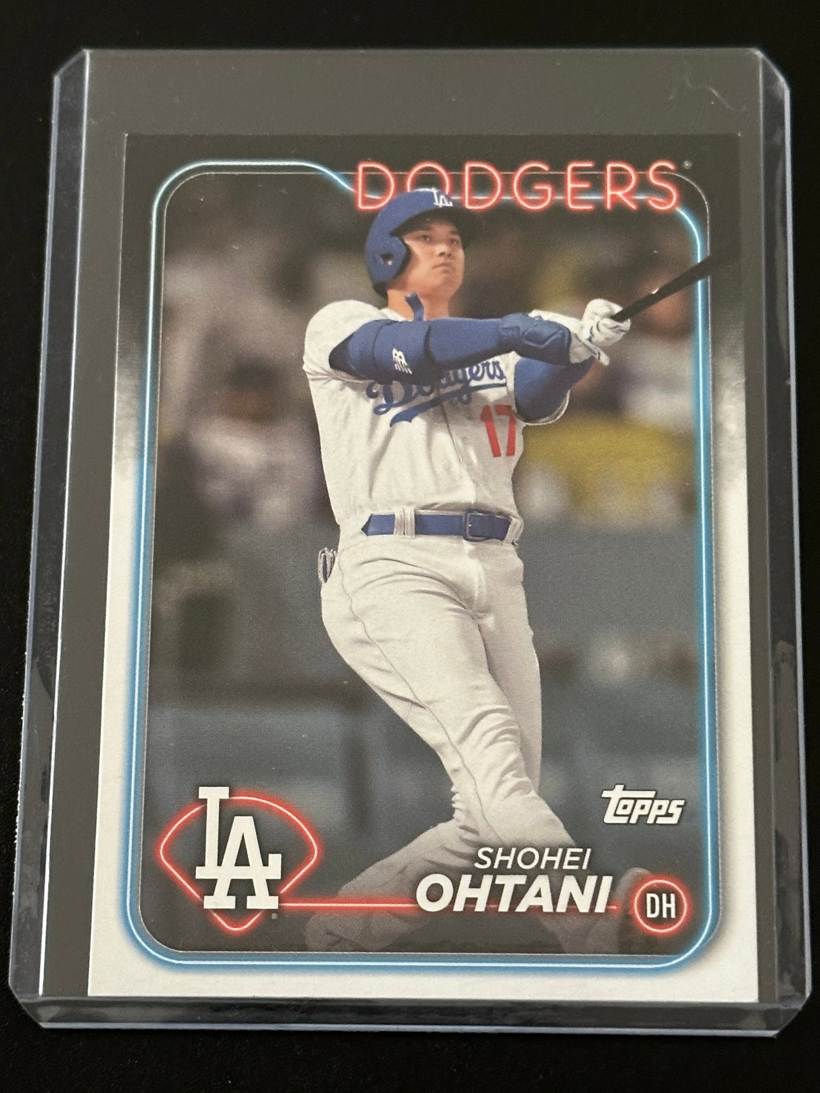 2024 Topps Shohei Ohtani #500 trading card featuring him in a Los Angeles Dodgers: 2024 Topps Shohei Ohtani #500 trading card featuring him in a Los Angeles Dodgers uniform.