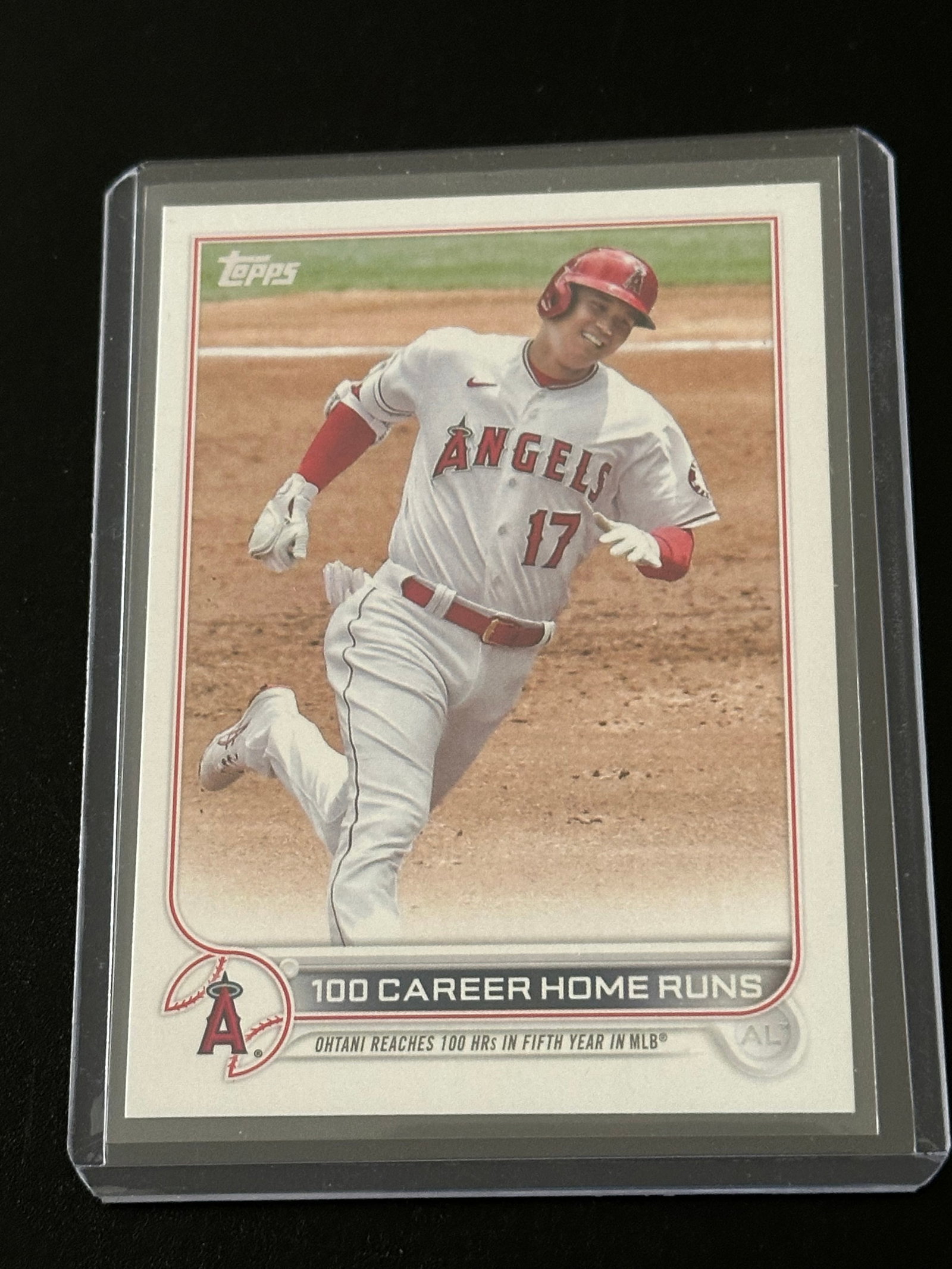 2022 Topps Update Shohei Ohtani baseball card: 2022 Topps Update Shohei Ohtani baseball card, specifically celebrating his 100th career home run (#US92).T