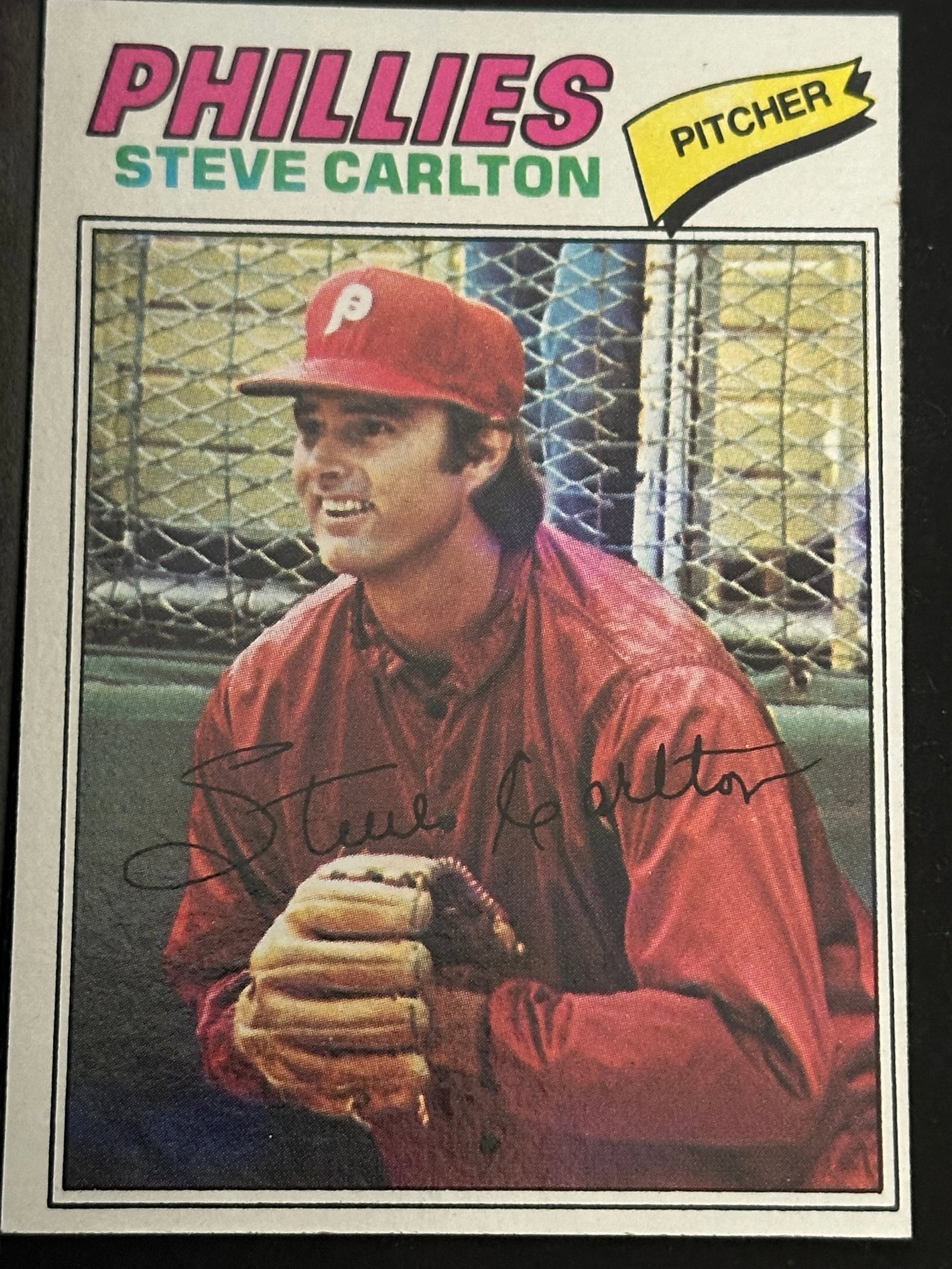 1982 Topps Steve Carlton Baseball Card: 1982 topps baseball card featuring philadelphia phillies pitcher steve carlton. The card displays a portrait of carlton and includes his printed signature on the front.