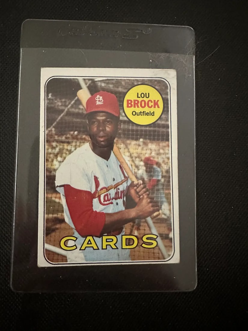 baseball card featuring the St. Louis Cardinals outfielder.: baseball card featuring the St. Louis Cardinals outfielder.-raw - ungraded - condition is as shown and sold as is