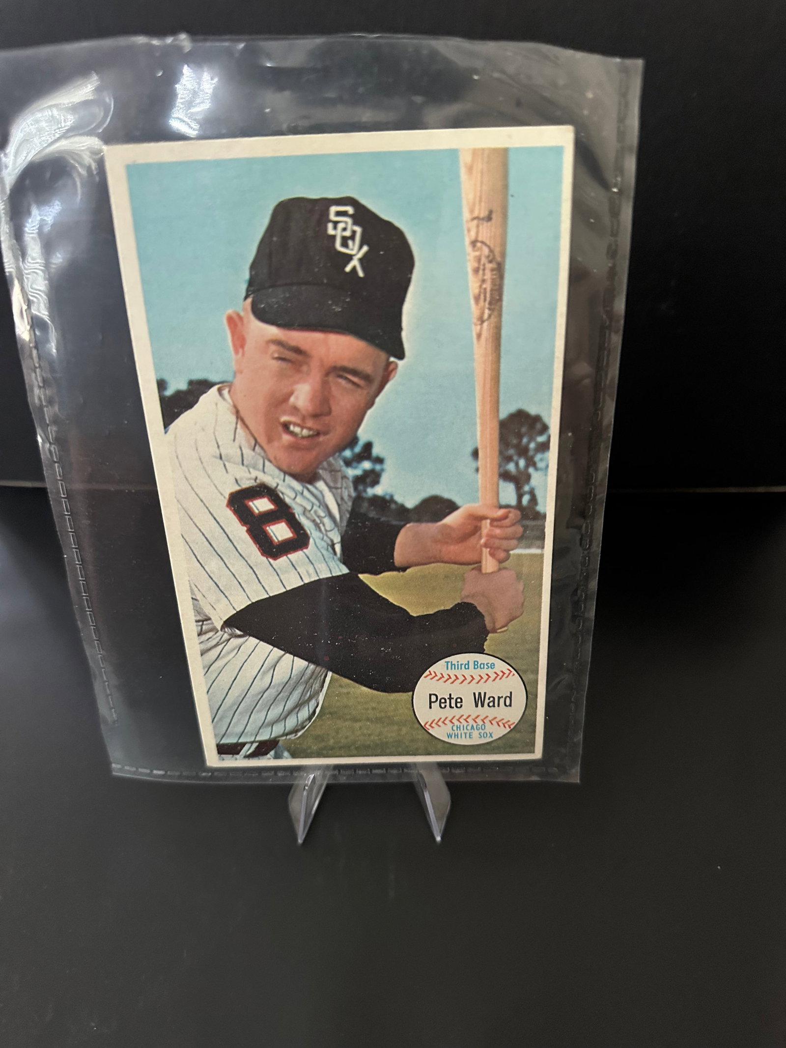 Giant 1964 Pete Ward Baseball Card: 1964 topps giant baseball card featuring pete ward, who played third base for the chicago white sox. The card is numbered 528 and showcases a colorful portrait of ward ready to bat. It is