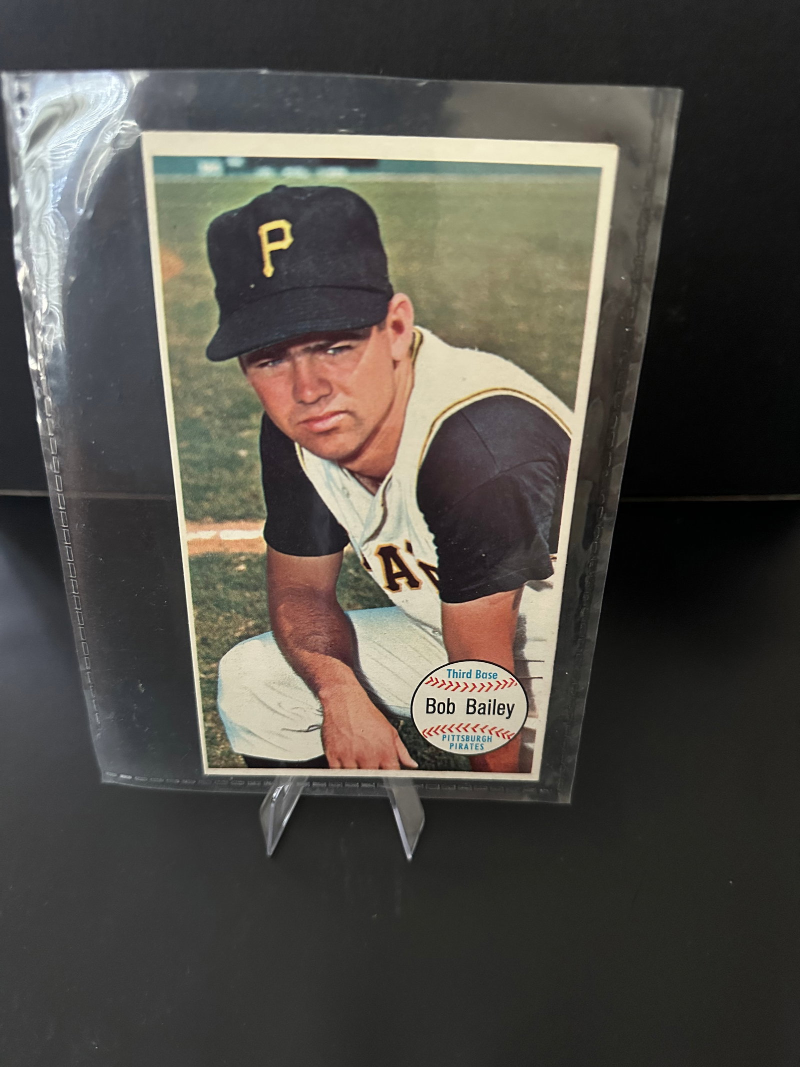 1964 Topps Giant Bob Bailey Baseball Card: This is a 1964 topps bob bailey baseball card featuring the pittsburgh pirates player. The card shows bailey in his baseball uniform, complete with the iconic 'p' on his cap. It's well-preserved, show