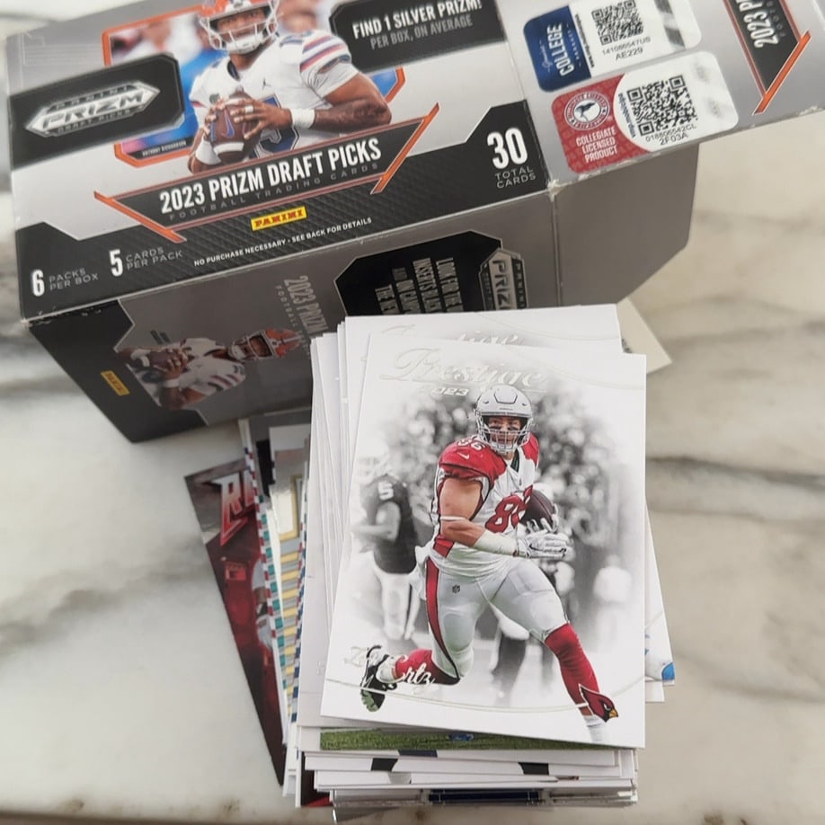 Usorted in a BOX says 2023 Panini Prizm Draft Picks Football Hobby Box: BOX IS JUST THE CONTAINER 2023 SEE Misc Pics of the Cards in the Box - Opened and Unsorted ....Looks Like Random Cards / Pulls from Different Types of Sets, Companies