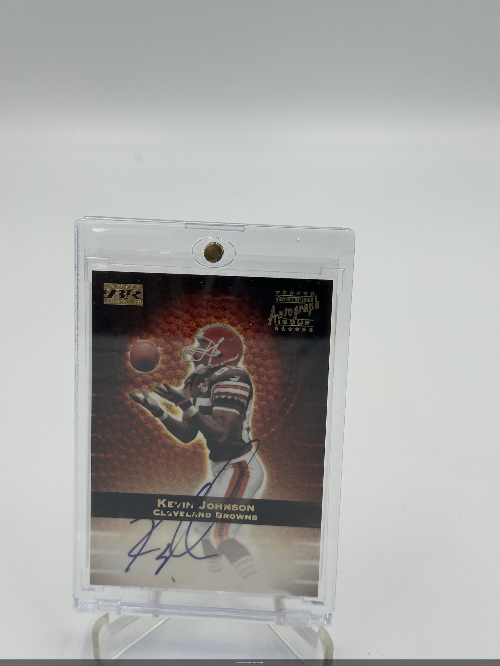 Kevin Johnson Autographed Football Card: Kevin johnson autographed football trading card featuring him as a player for the cleveland browns. The card is a certified autograph issue, showcasing johnson in action during a game. It stands out w