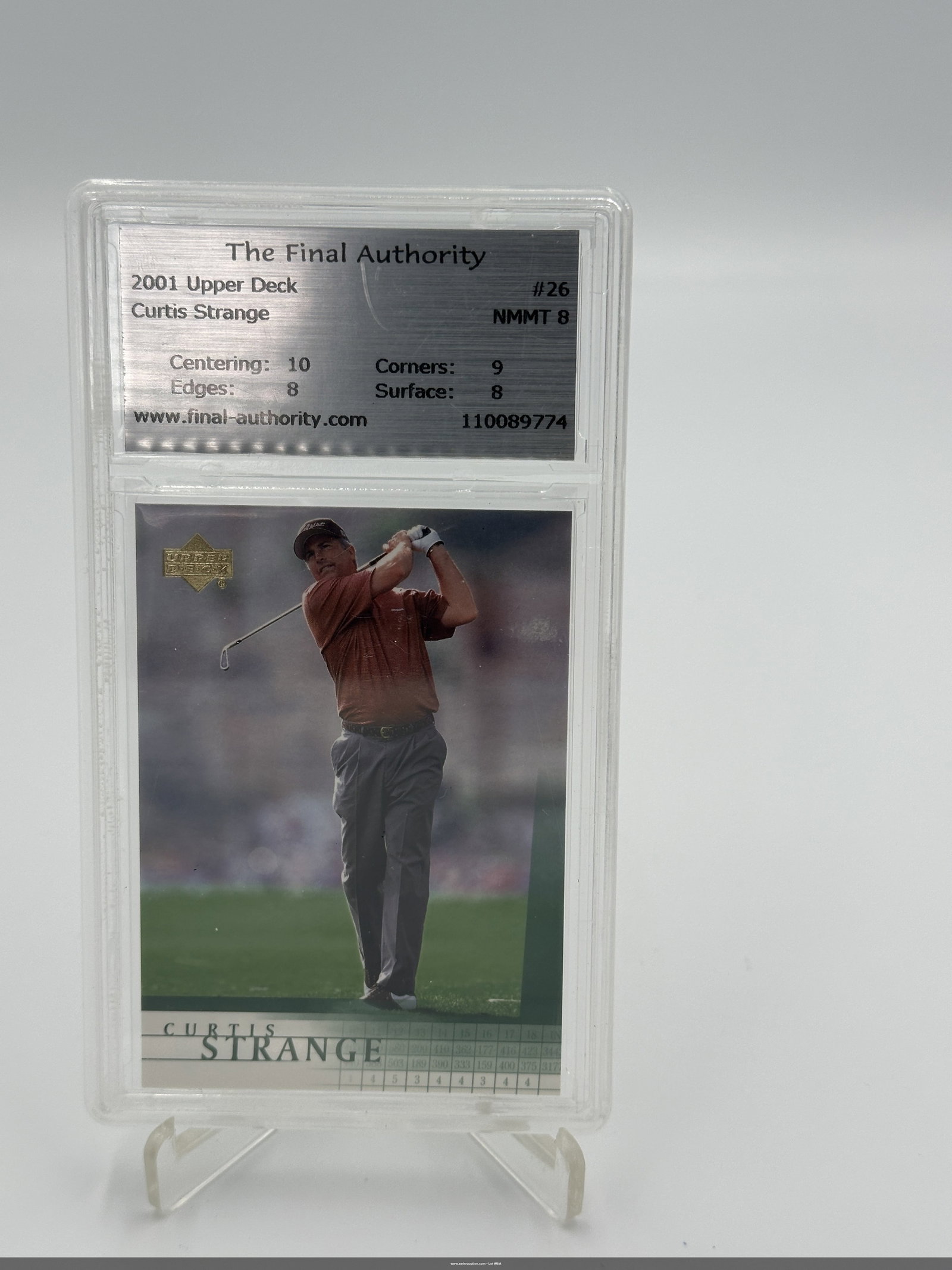 2001 Upper Deck Curtis Strange #26 Nm-mt 8 Golf Card: Curtis strange, a renowned professional golfer. The card is graded as nm-mt 8, indicating excellent condition with slight wear, showcasing centering at 10, edges at 8, corners at 9, and surface at 8.