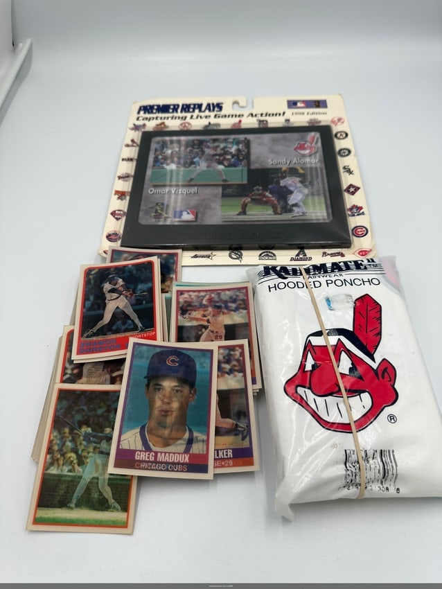 1998 Premier Replays Baseball Set Cleveland Indians Hooded Poncho: This collectible set includes a hooded poncho featuring the cleveland indians logo and a premier replays card featuring iconic baseball moments. Perfect for fans and collectors alike! This collectible