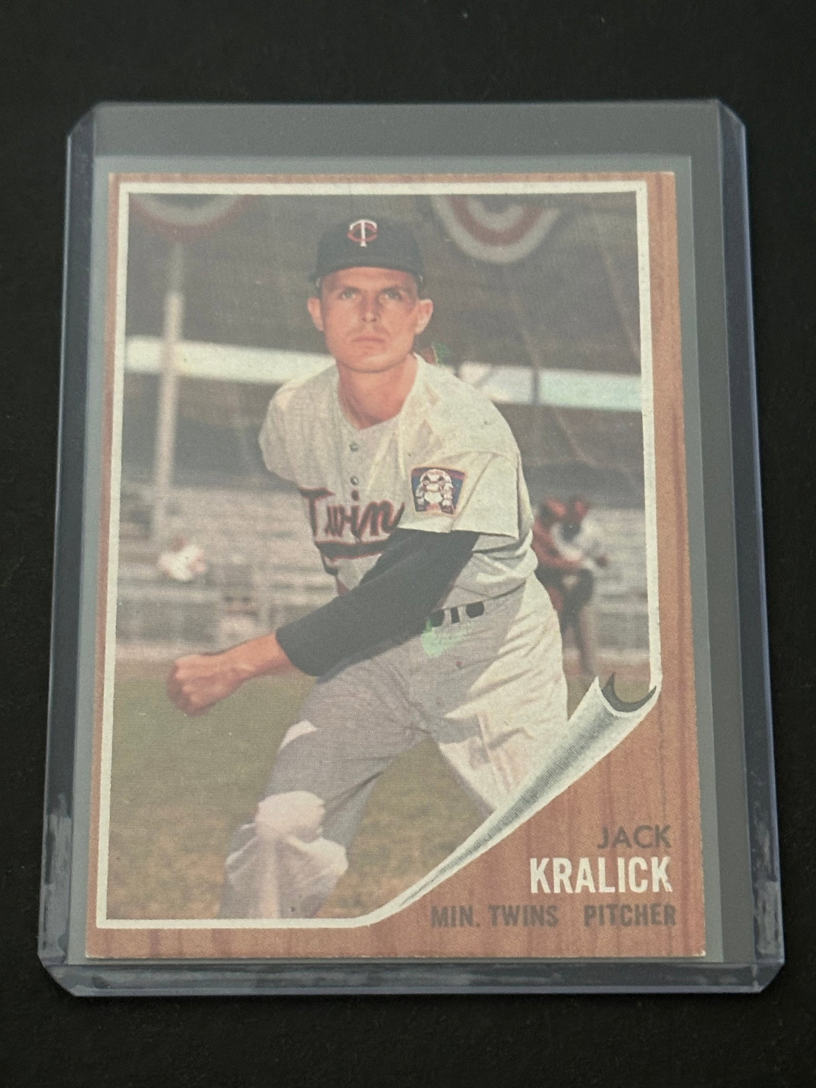 1962 Topps Jack Kralick Minnesota Twins: 962 topps baseball card featuring jack kralick of the minnesota twins. The card displays a classic wood-grain border design characteristic of the 1962 topps set.