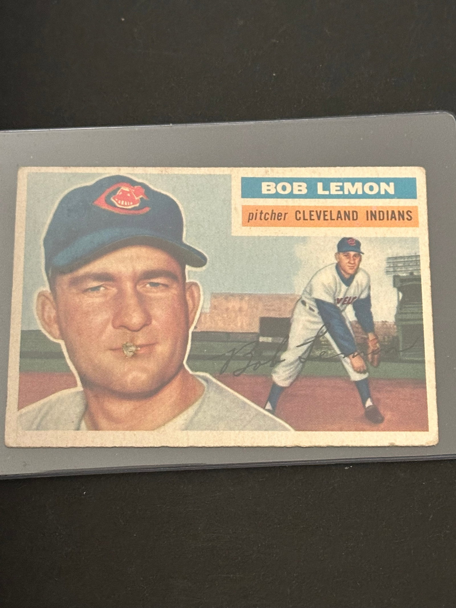 1954 Topps Bob Lemon Cleveland Indians Baseball Card: 1954 topps baseball card featuring bob lemon of the cleveland indians. The card shows both a portrait and an action shot of the pitcher in his team uniform.