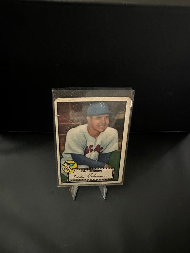 Eddie Robinson 1952 Topps Baseball Card: This is a 1952 topps baseball card featuring eddie robinson, a former player associated with chicago. The card is notable for its vintage aesthetic and features robinson in a team uniform, complete