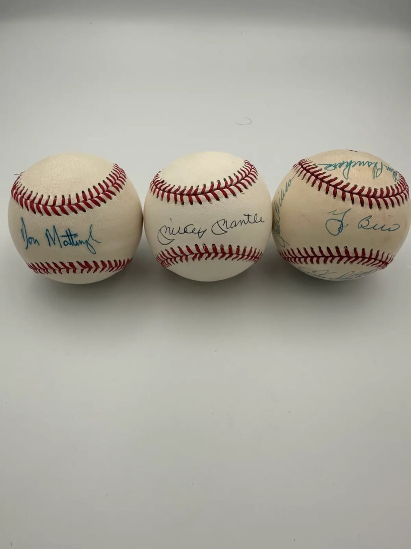 Yankees Greats - Signed Baseball Lot: Mickey mantle signed ball no coas - signatures not looked at by any expert - sold as is and no opinion on authenticity - mickey mantle signed ball don mattingly, featuring his signature in blue ink.