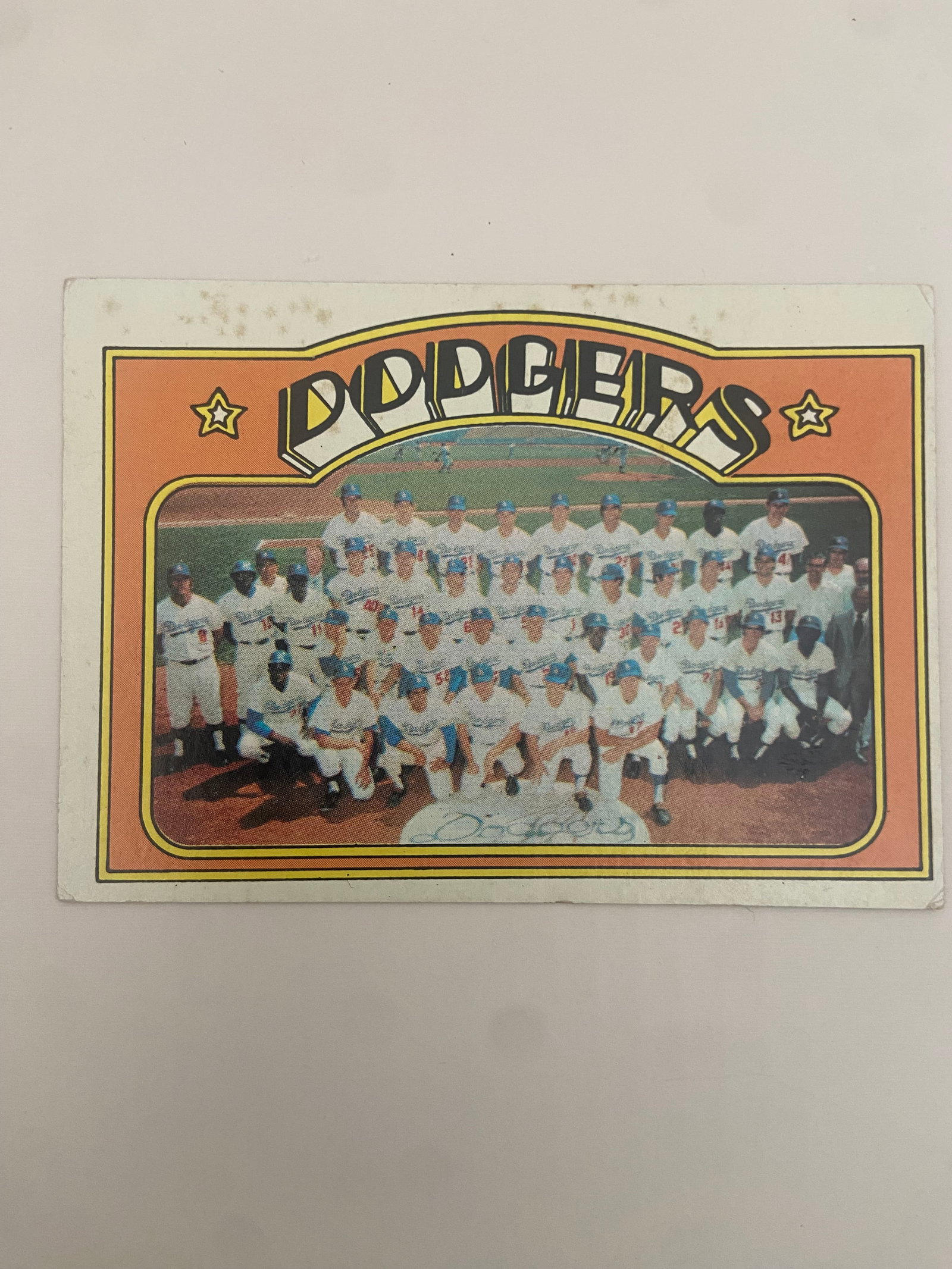 1972 Topps #522 Dodgers Team No Creases: #522 from the 1972 topps baseball set, featuring dodgers team records. The card lists various historical batting and pitching stats for the los angeles dodgers franchise, including world series