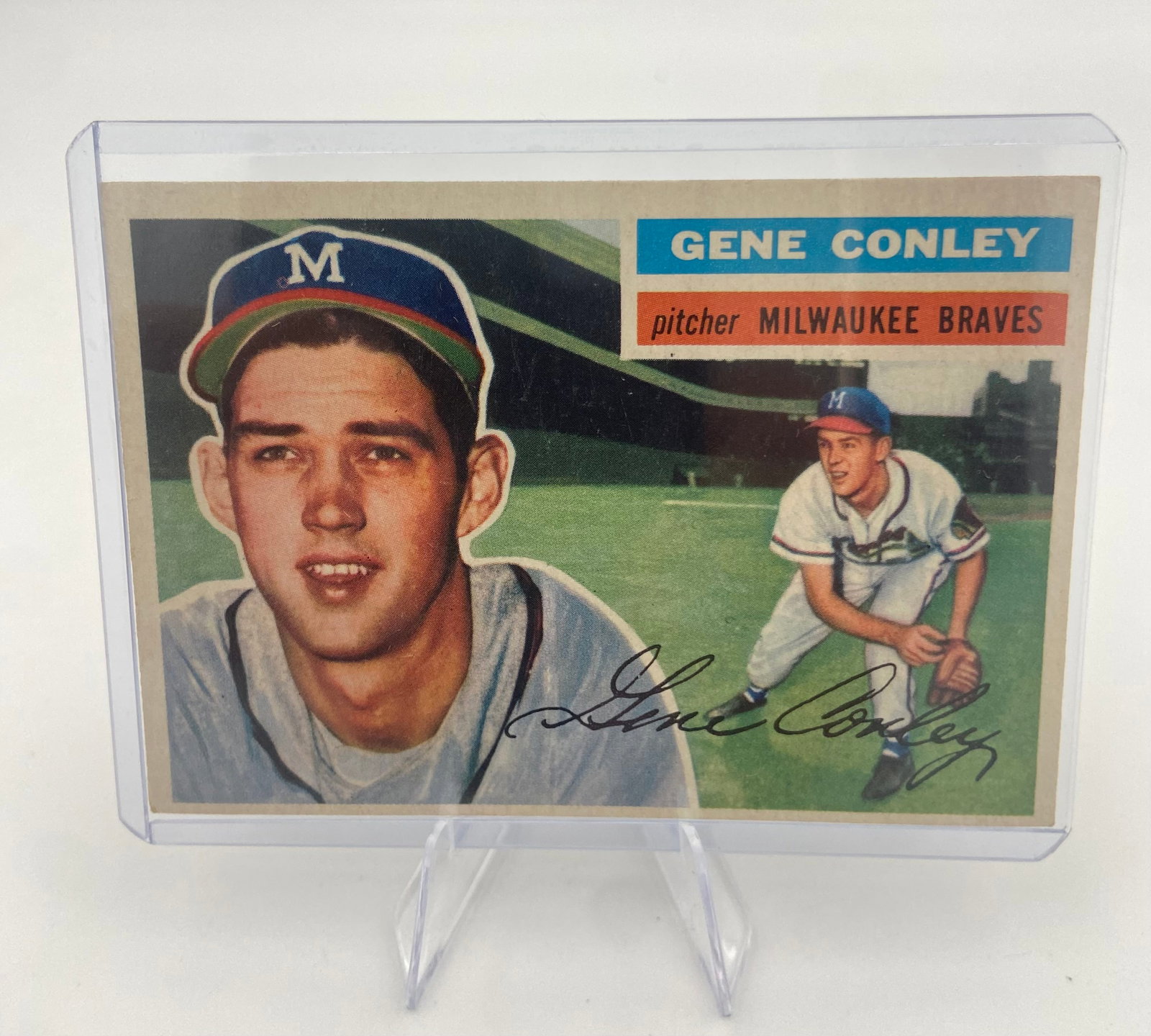 1956 Topps Gene Conley Milwaukee Braves Baseball Card: Raw - ungraded - condition is as shown and sold as is Milwaukee Braves pitcher Gene Conley. The card shows a portrait and a full-body action shot, along with a facsimile autograph.