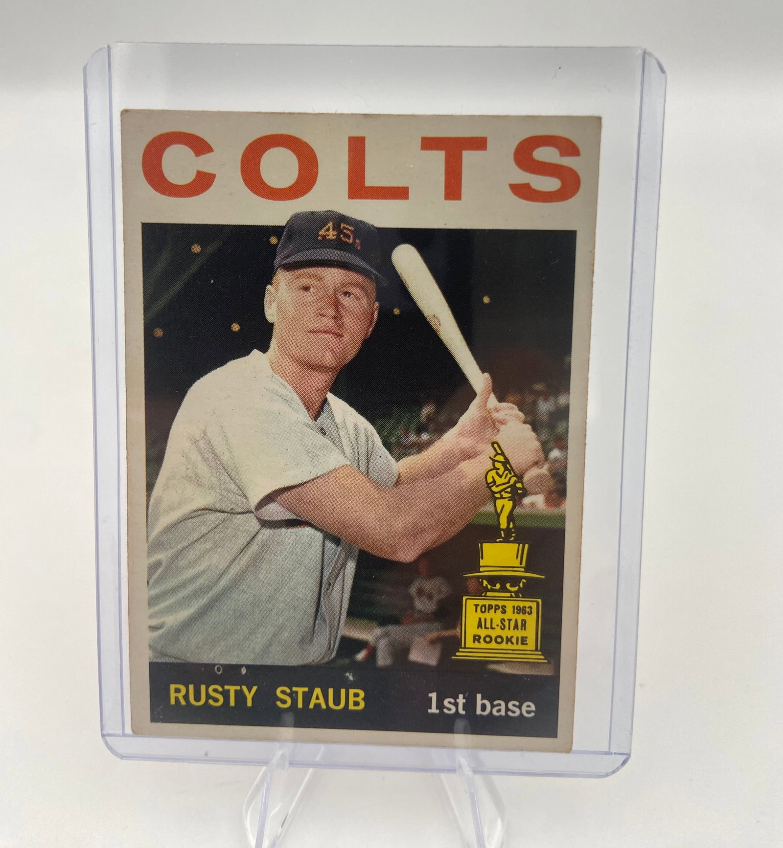 1963 Topps Rusty Staub Rookie Card: This is a 1963 Topps baseball card featuring Rusty Staub of the Houston Colt .45s. This card is designated as a Topps 1963 All-Star Rookie card, commemorating his early professional career. The card i