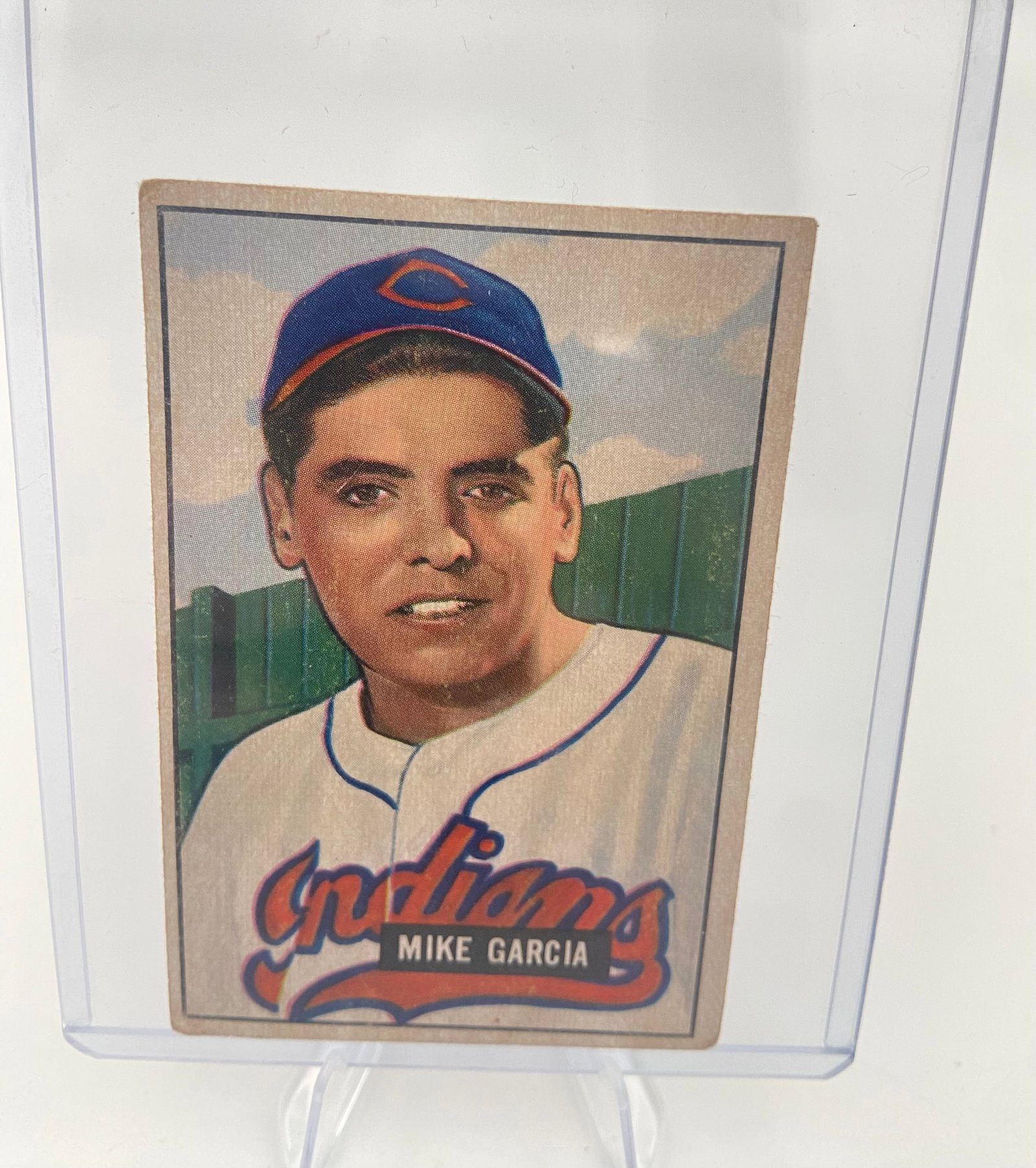 1952 Bowman Mike Garcia Cleveland Indians Baseball Card: This is a 1952 Bowman baseball card featuring Mike Garcia of the Cleveland Indians. The card features a painted portrait style characteristic of the 1952 Bowman set, which is known for its vibrant col