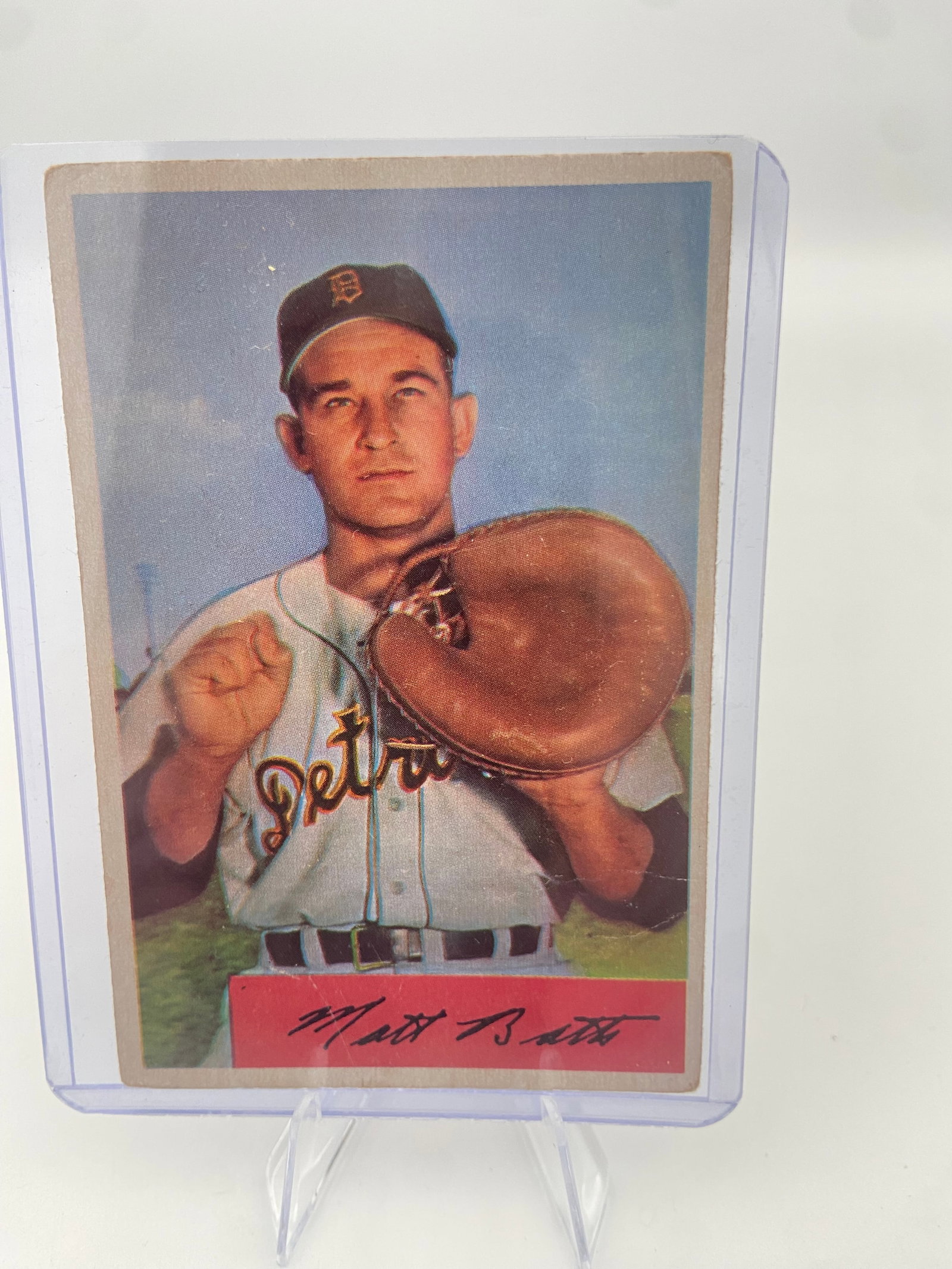 1953 Topps Matt Batts Baseball Card: This is a 1953 Topps baseball card featuring Matt Batts, who played as a catcher for the St. Louis Browns. The card displays a classic color portrait of the player with his glove and a printed