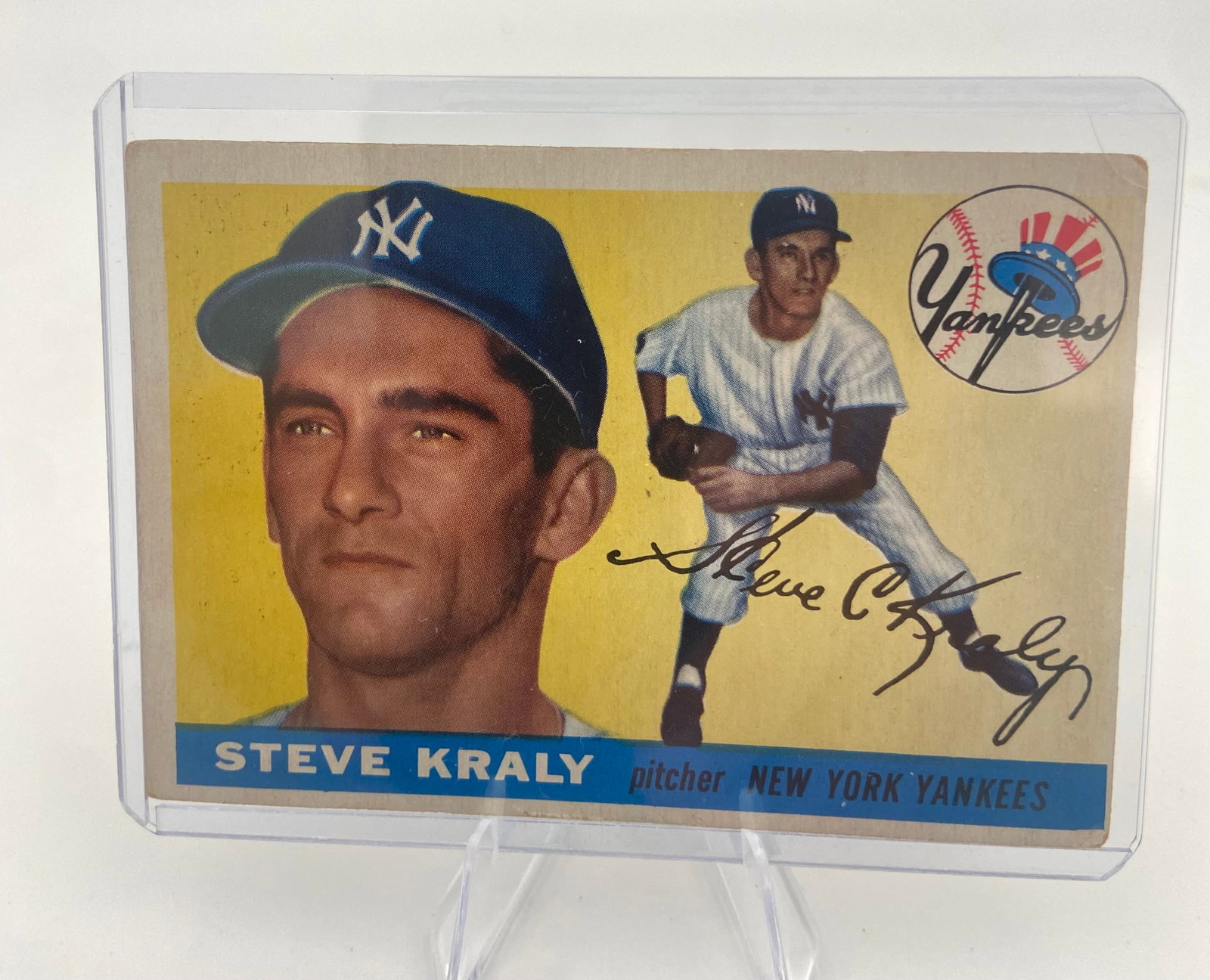 1953 Bowman Steve Kraly New York Yankees Baseball Card: This is a 1953 Bowman baseball card featuring New York Yankees pitcher Steve Kraly. The card features a vibrant yellow background, a facsimile signature, and the classic Yankees team logo. It is