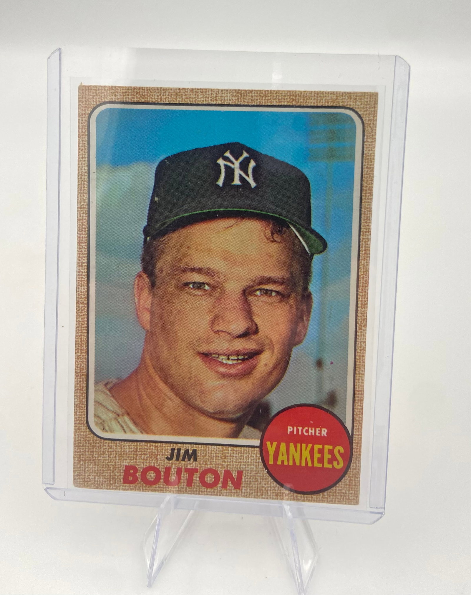 1966 Topps Jim Bouton Baseball Card: This is a 1966 Topps baseball card featuring New York Yankees pitcher Jim Bouton. The card features a close-up portrait of the player with his name and team information clearly visible.