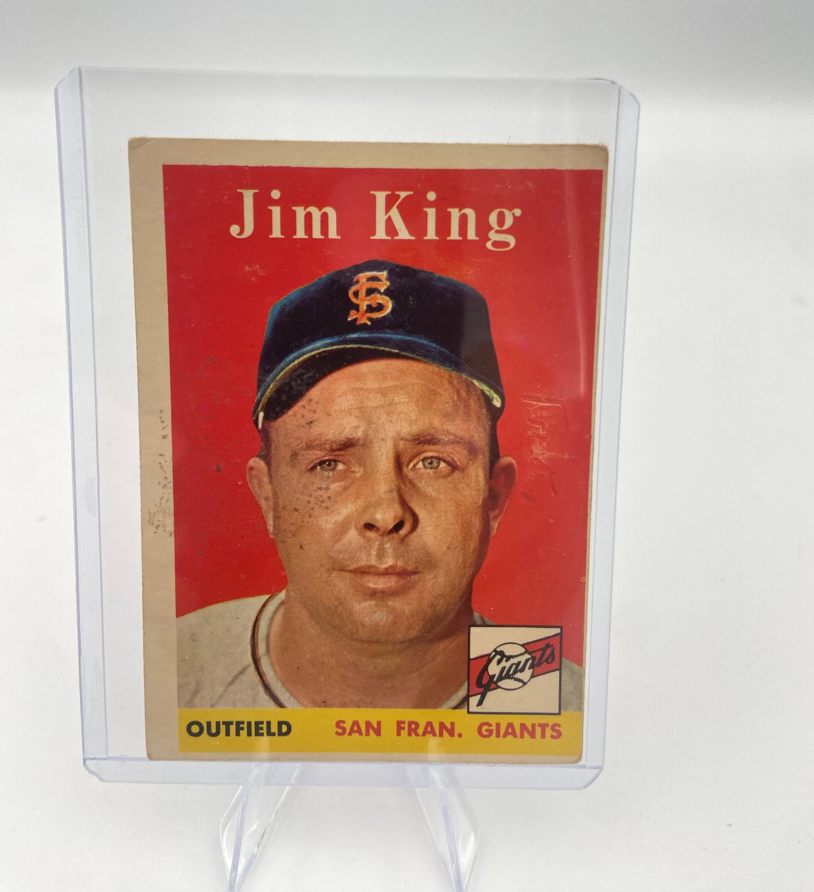 1960 Topps Jim King Baseball Card: This is a 1960 Topps baseball card featuring San Francisco Giants outfielder Jim King. The card showcases a vibrant red background and the classic 1960 design with the team name displayed in a