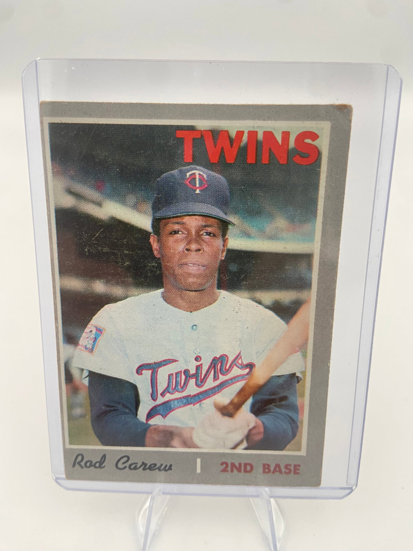 1972 Topps Rod Carew Baseball Card: This is a 1972 Topps baseball card featuring Minnesota Twins Hall of Famer Rod Carew. The card design features a distinctive gray border and large team name lettering characteristic of the 1972 set.