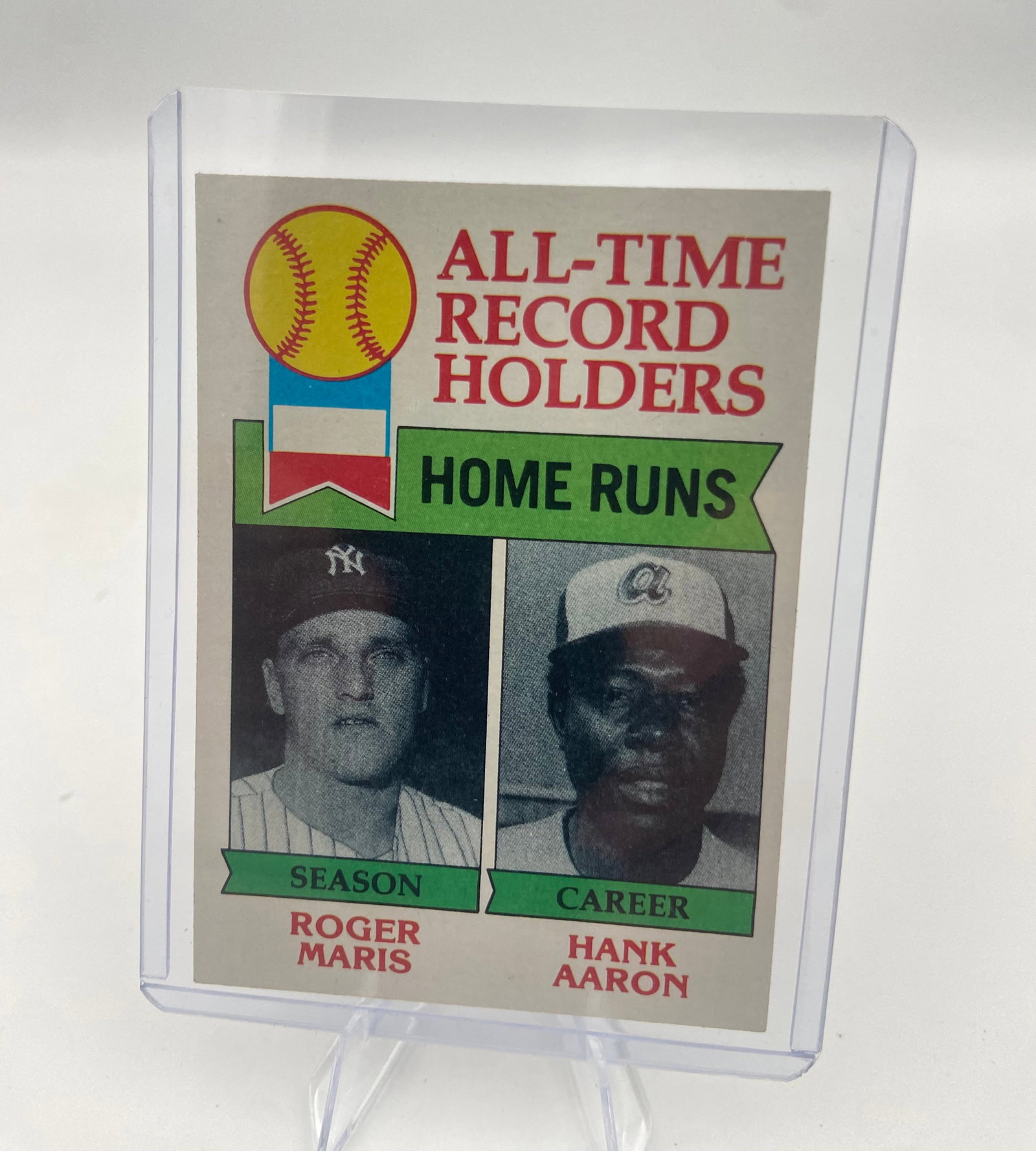 1974 Topps All-Time Record Holders Roger Maris Hank Aaron: This is a 1974 Topps baseball card featuring All-Time Home Run Record Holders Roger Maris and Hank Aaron. The card highlights Maris's single-season record and Aaron's career record, marking a pivotal