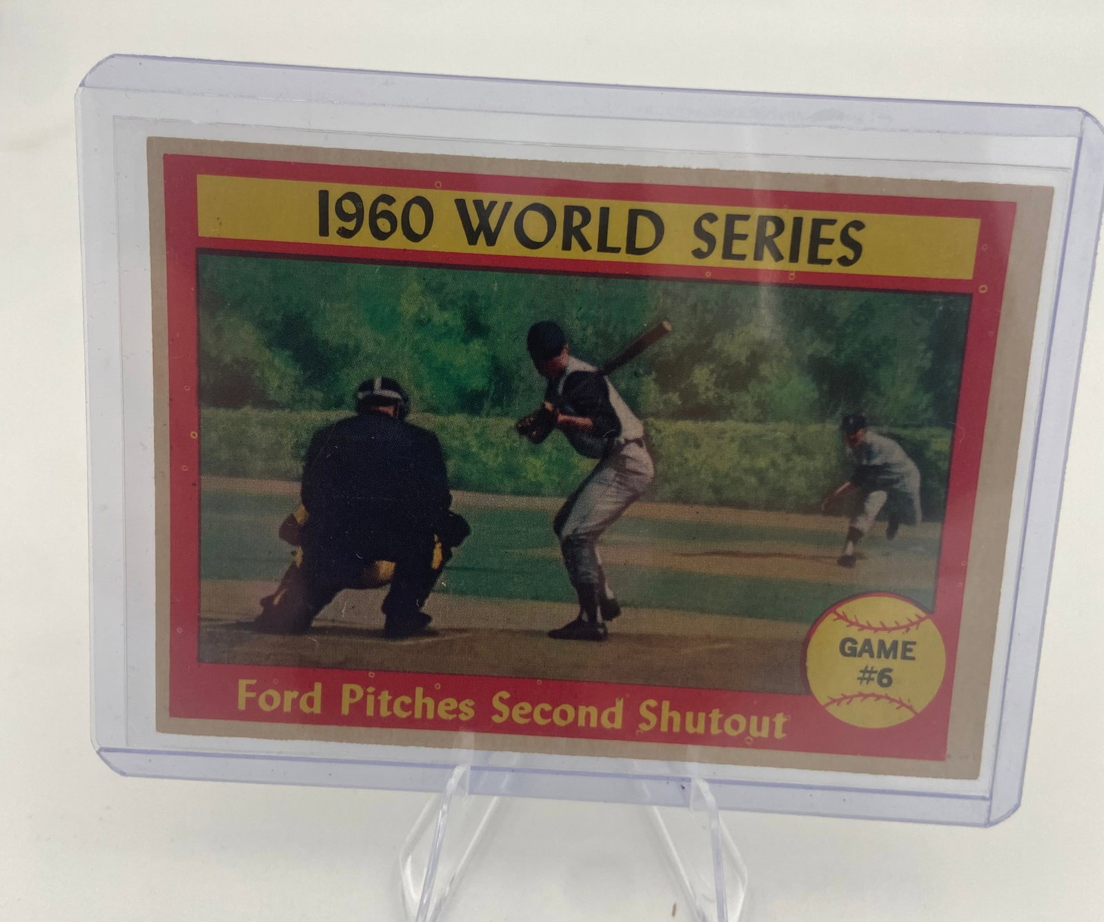 1960 Topps World Series Card 148 Ford Pitches Second Shutout: This is a 1960 Topps baseball card, number 148, depicting the 1960 World Series Game 6. The card is titled 'Ford Pitches Second Shutout' and highlights the performance of Yankees pitcher Whitey Ford.