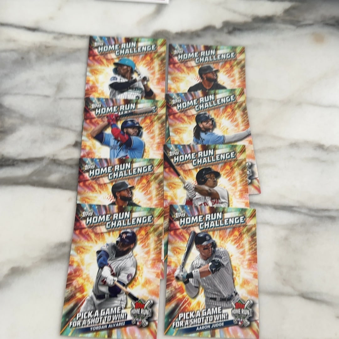 Topps Home Run Challenge trading cards: This is a collection of Topps Home Run Challenge trading cards featuring various Major League Baseball players in a dynamic, explosive graphic design. The cards include notable players like Aaron