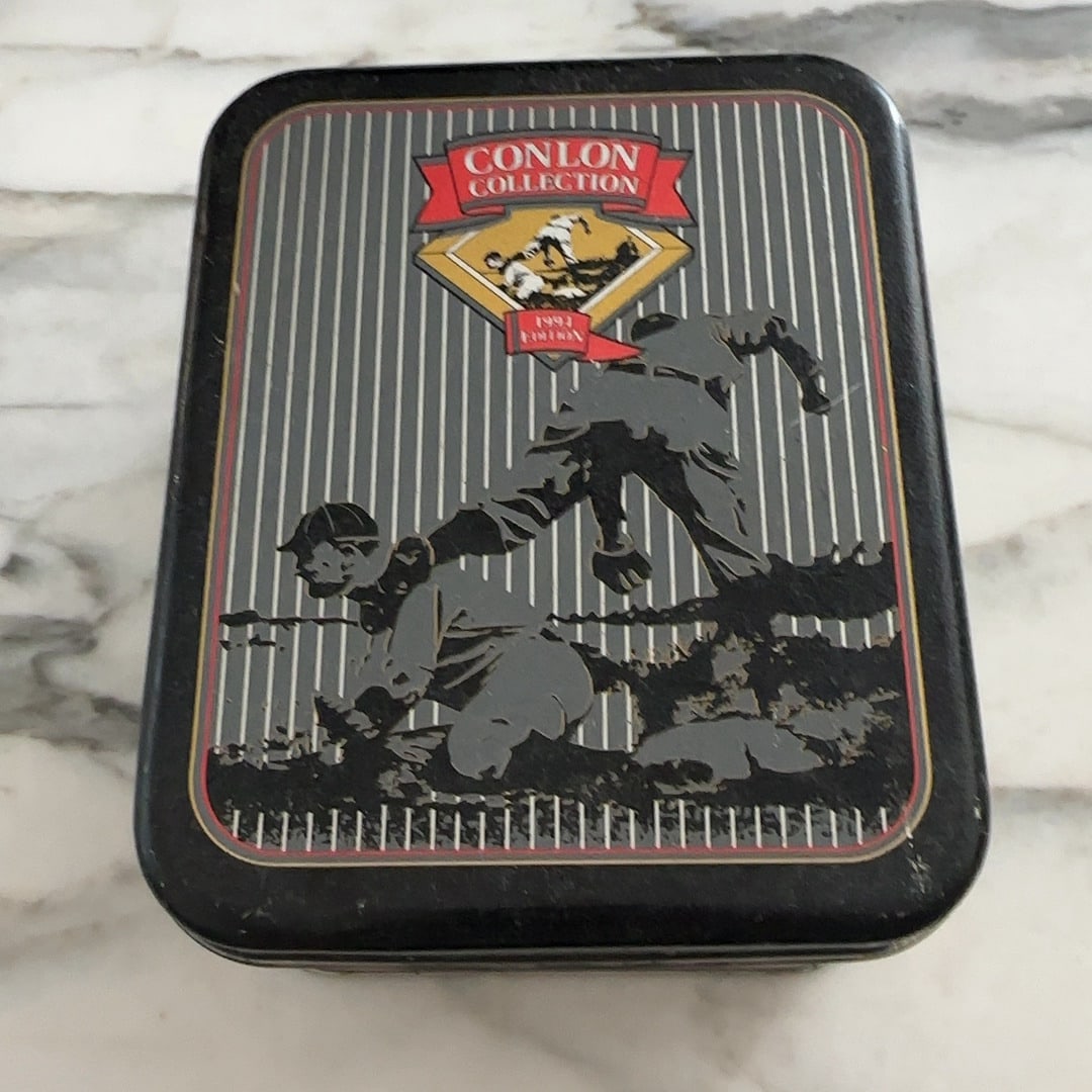 Small Sets - Sports Trading Cards: This is a collectible metal tin from the Conlon Collection, identified as the 1994 Edition. The lid features a vintage-style graphic of a baseball player sliding into base. -