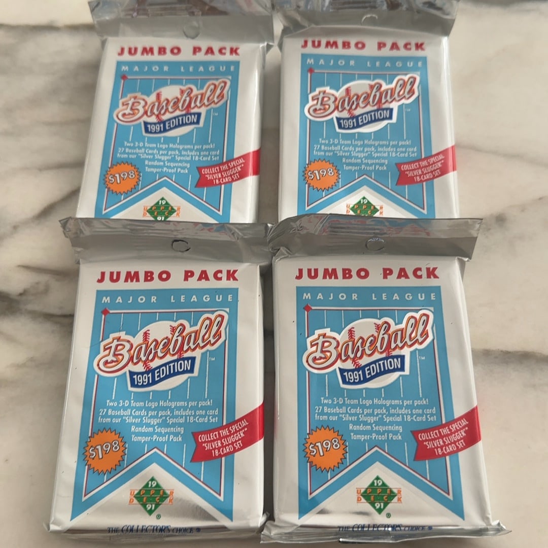 4 factory-sealed 1991 Upper Deck Baseball Jumbo Packs: 4 factory-sealed 1991 Upper Deck Baseball Jumbo Packs (likely High Series or Low Series featuring the blue holographic foil design). These