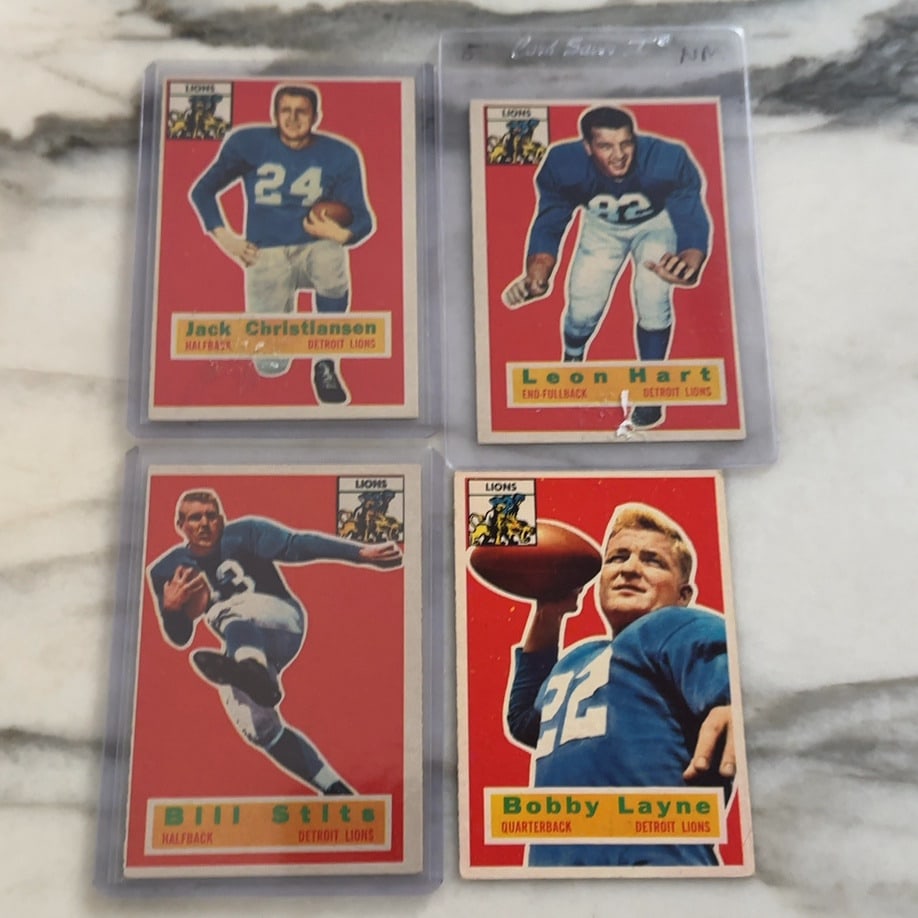 Jack Christiansen, Leon Hart, Bill Stits, and Bobby Layne De: This lot features four vintage football cards including Jack Christiansen, Leon Hart, Bill Stits, and Bobby Layne. Each card prominently displays the player's name, position, and the Detroit Lions