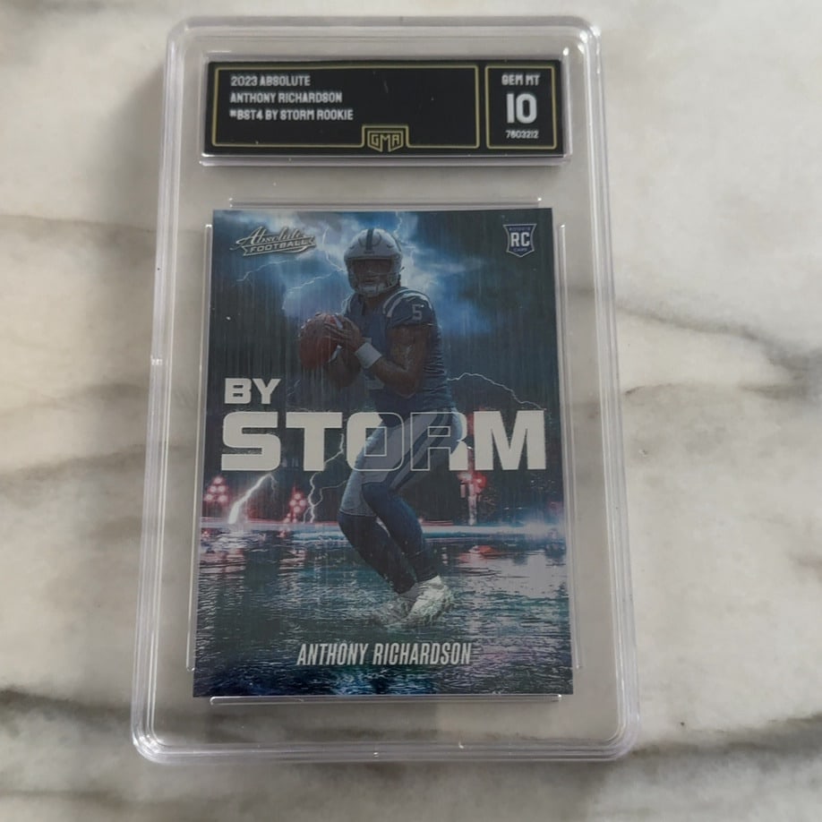 2023 Absolute Anthony Richardson By Storm Rookie Card: This is a 2023 Absolute Football 'By Storm' rookie card featuring Anthony Richardson. The card is professionally graded by GMA with a GEM MT 10 rating.