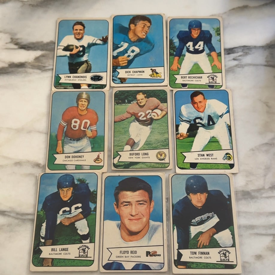 1953 Bowman Football Trading Card Collection: This is a collection of nine 1953 Bowman football trading cards featuring players Lynn Chandnois, Dick Chapman, Bert Rechichar, Don Dohoney, Buford Long, Stan West, Bill Lange, Floyd Reid, and Tom Fin