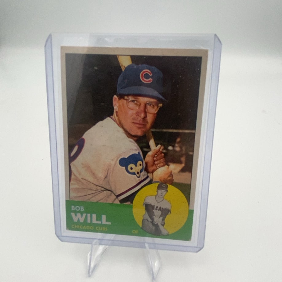 Bob Will: This is a vintage baseball card featuring Chicago Cubs player Bob Will. The card shows a portrait photo of the player above a green banner with his name and position.Raw - ungraded - condition is as s