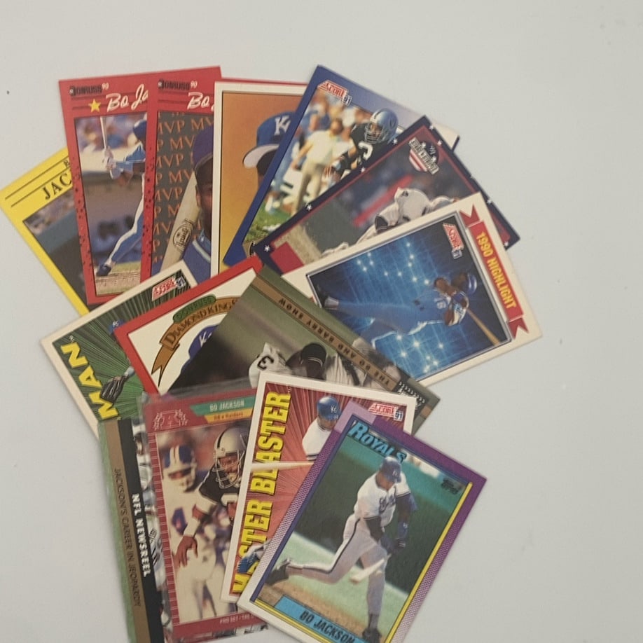 Bo Jackson Trading Card Assortment: collection of mixed trading cards featuring Bo Jackson. The set includes cards from manufacturers like Donruss, Score, and Pro Set,Raw - ungraded - condition is as shown and sold as is