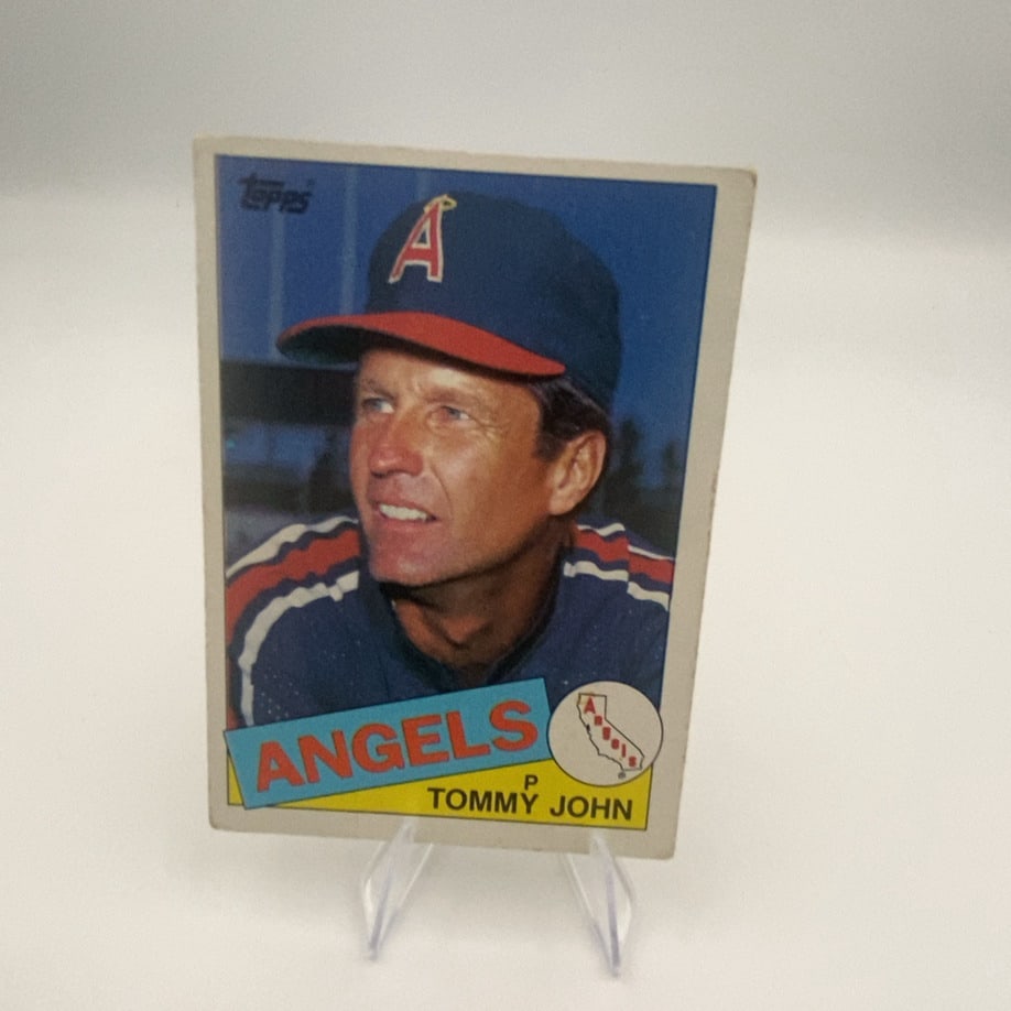 Tommy John 1983 Topps Angels: 1983 Topps baseball card featuring pitcher Tommy John of the California Angels. The card features a portrait of the player, the team name, and a small map graphic of California.Raw - ungraded - condit