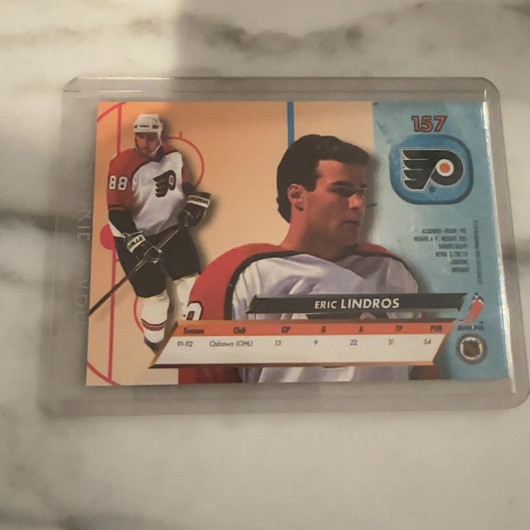 1992-93 Fleer Ultra Eric Lindros #157: This is a 1992-93 Fleer Ultra hockey card featuring Philadelphia Flyers star Eric Lindros. The card features a dual-image design with his name and statistics displayed prominently.