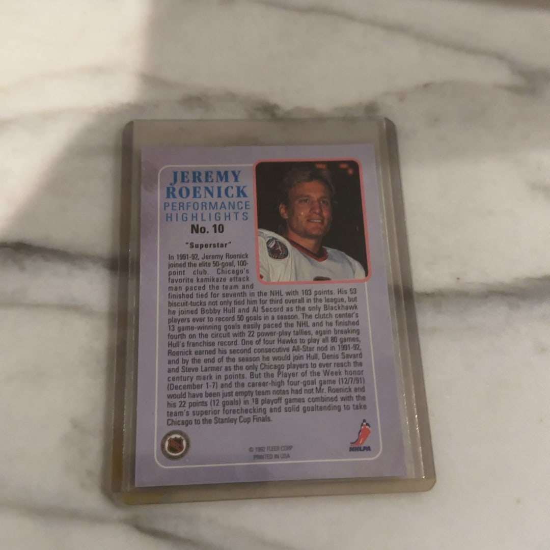 1992 Fleer Jeremy Roenick Performance Highlights Card: This is a 1992 Fleer hockey trading card featuring Jeremy Roenick from the Performance Highlights insert set. The back of the card provides detailed biographical and statistical information regarding 
