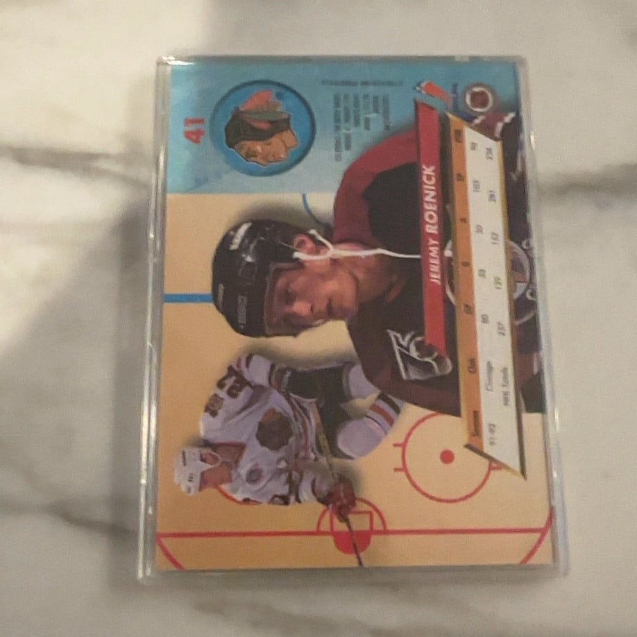 1992-93 Topps Jeremy Roenick Hockey Card: This is a 1992-93 Topps hockey trading card featuring Chicago Blackhawks center Jeremy Roenick. The card displays a dynamic graphic design incorporating images of the player and his career