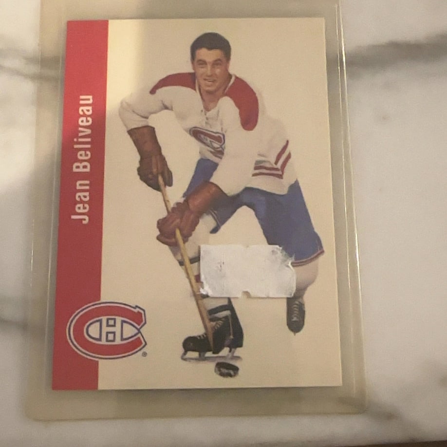 Jean Beliveau 1960-61 Parkhurst Hockey Card: This is a 1960-61 Parkhurst trading card featuring Montreal Canadiens hockey legend Jean Beliveau. The card features an action pose of the player in his iconic team uniform. Please note that the card